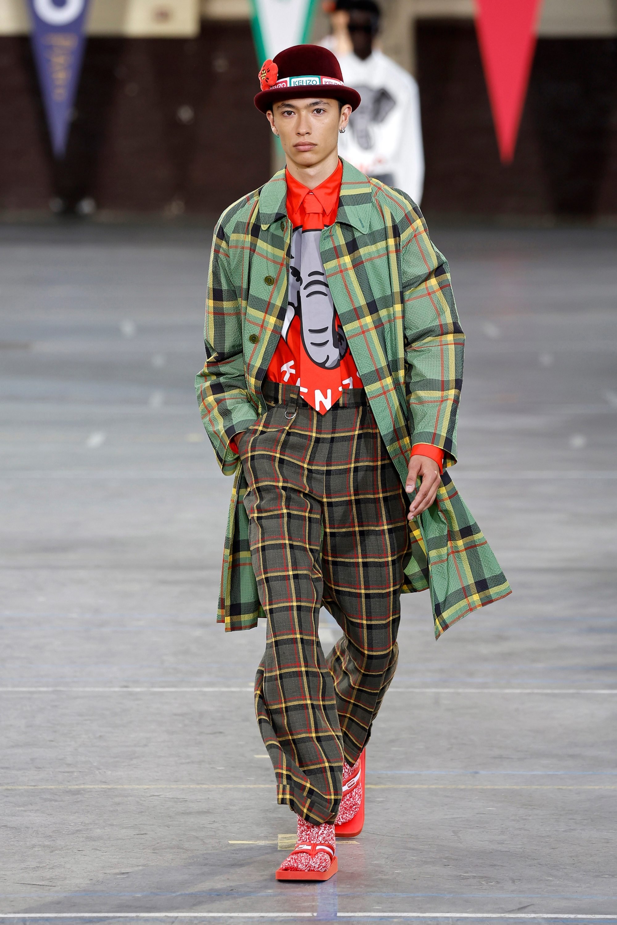 How Kenzo found a preppy, 70s groove at Paris Fashion Week: Nigo's  autumn/winter 2022 menswear collection mixed Scout's scarves with African  vibrancy and Asian crossover styles