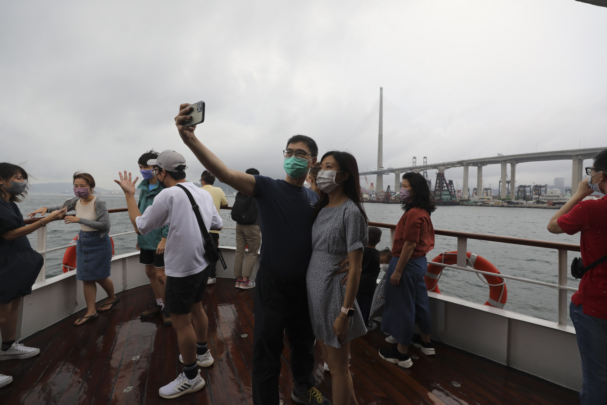 Selfie time aboard the converted Star Ferry as it passes Stonecutters Bridge. Photo: Xiaomei Chen
