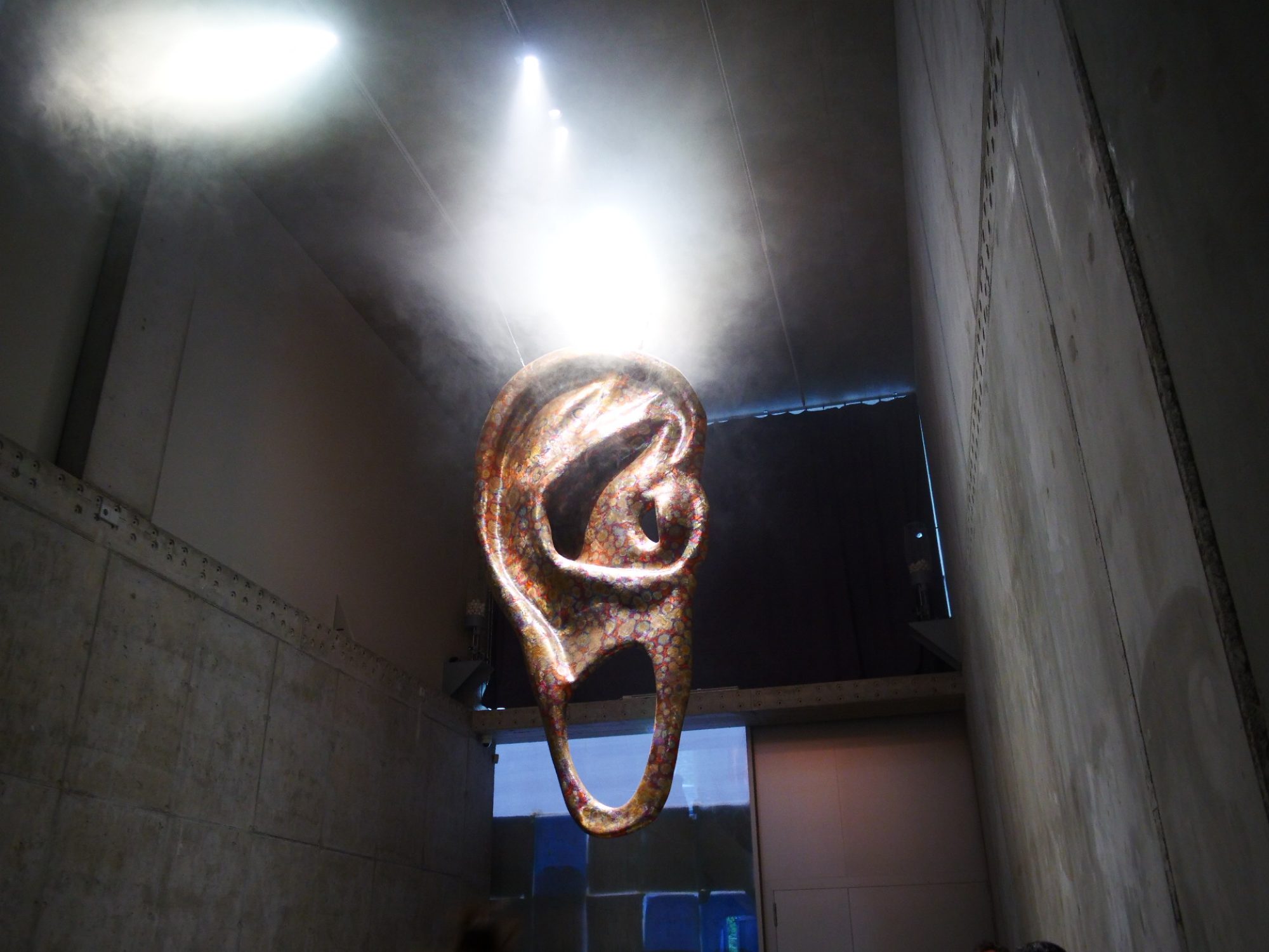 “blah-blah-blah“ (2022), a giant copper sculpture of an ear surrounded by machines projecting ping-pong balls, formed part of Hong Kong artist Wong Ping’s solo exhibition “Earwax” at Times Art Center Berlin. Photo: Kun Liang