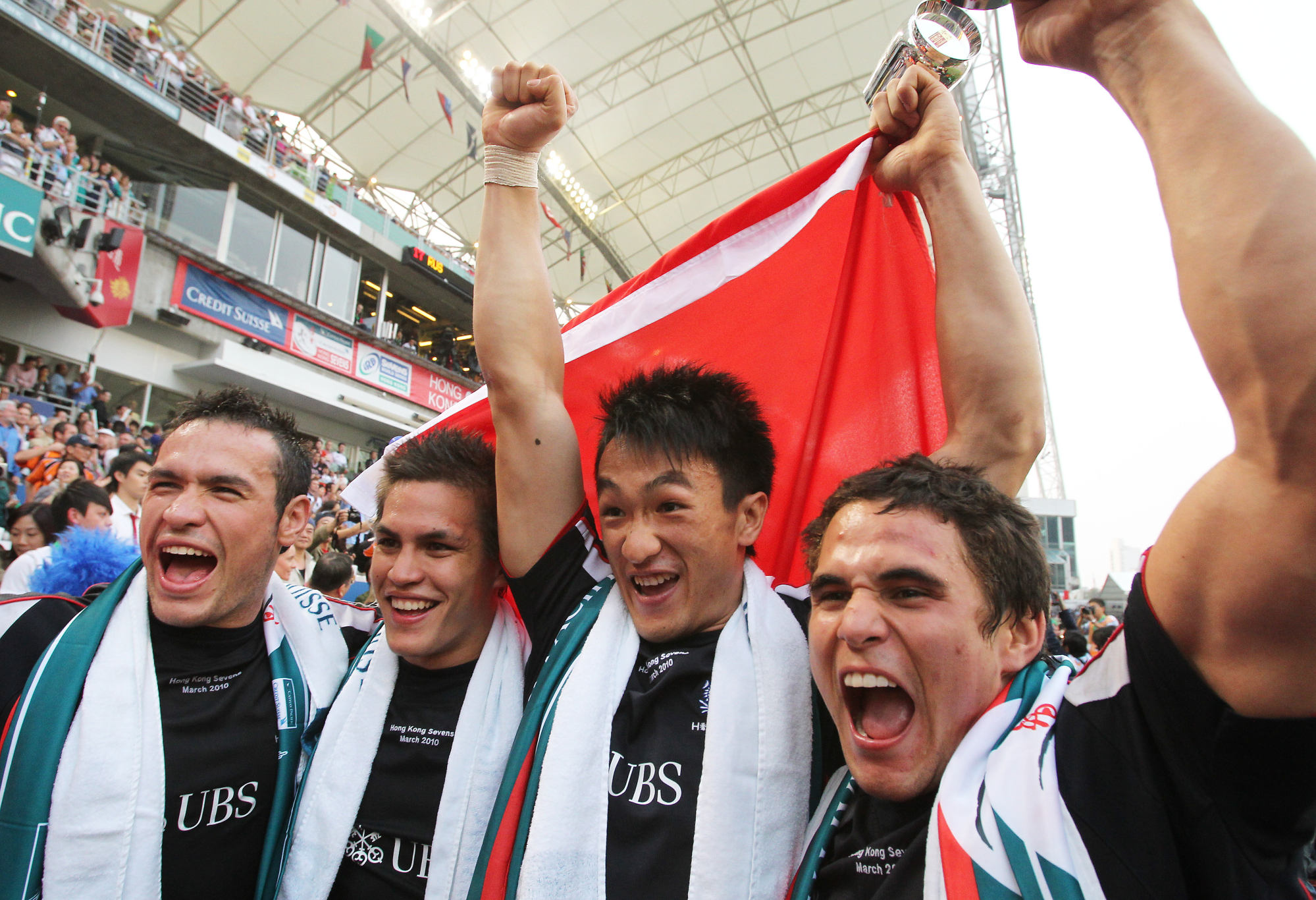 Simon Leung Ho-yam, Anthony Haynes, Salom Yiu Kam-shing and Rowan Varty of Hong Kong celebrate winning the Shield at the Hong Kong Sevens in 2010. Photo: Robert Ng