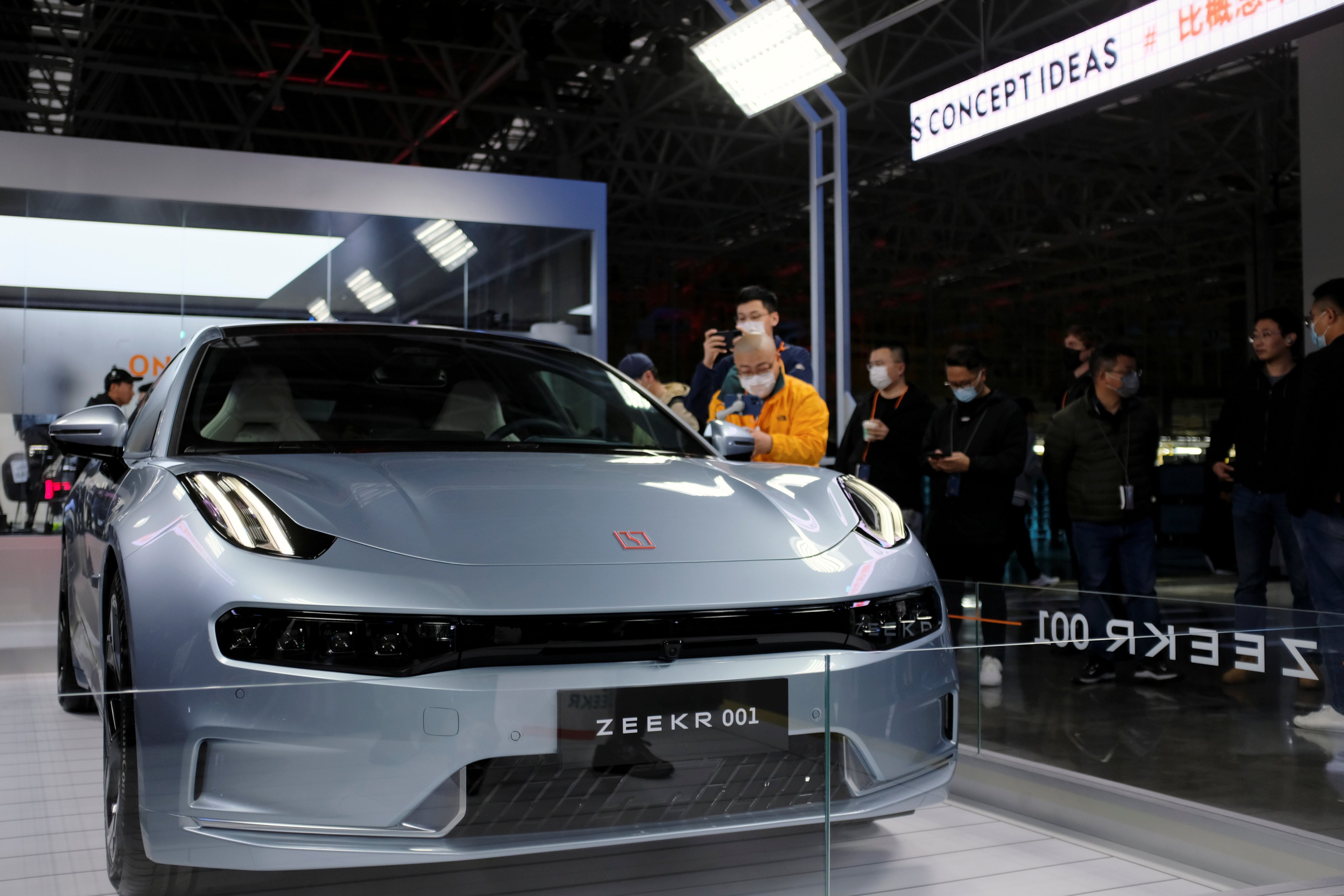 Visitors check out a Zeekr 001, a model from Geely’s premium electric vehicle (EV) brand Zeekr, at its factory in Ningbo, Zhejiang province, on April 15, 2021. Photo: Reuters