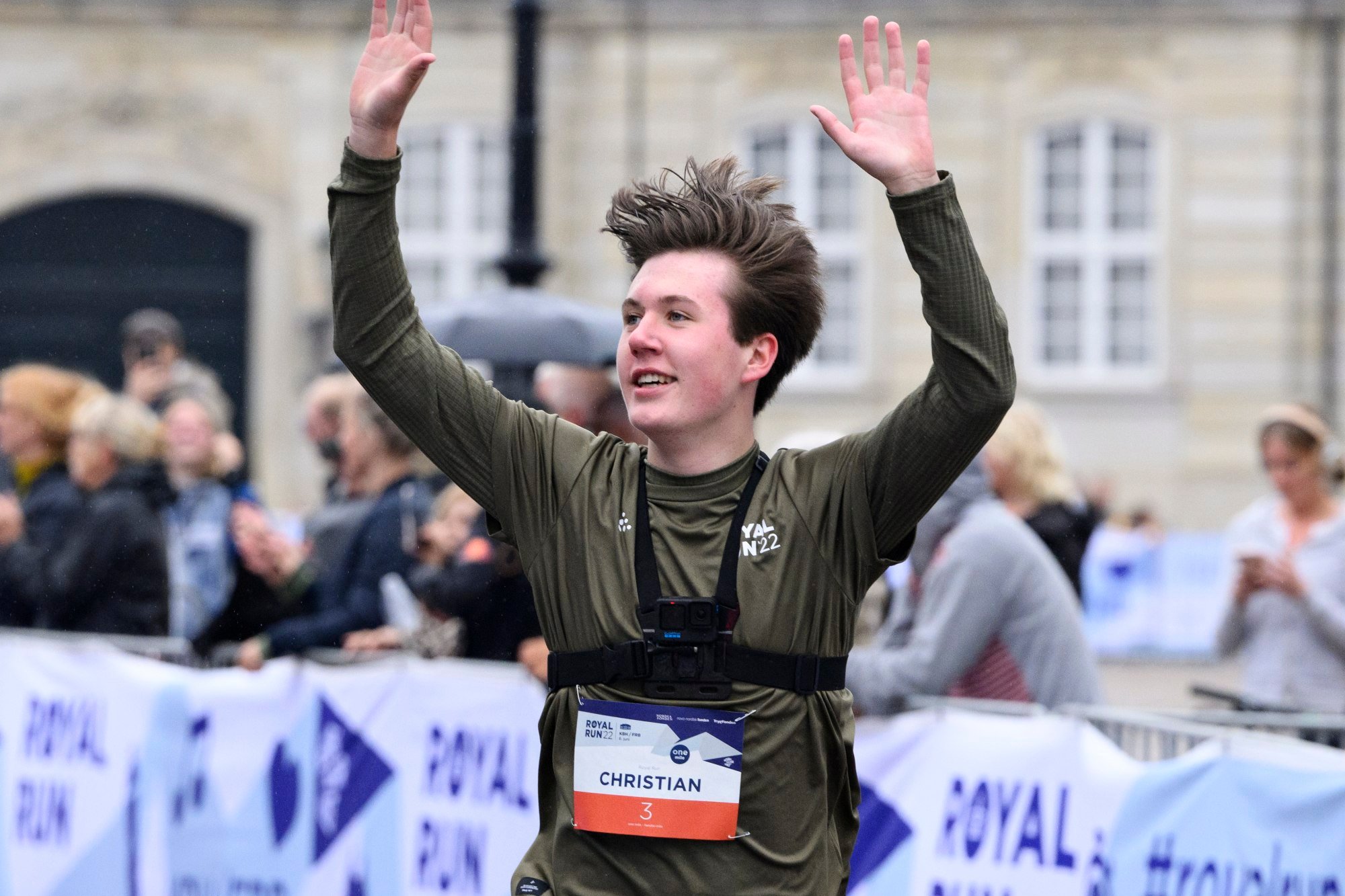 Danish Prince Christian waves at the finish line after attending the One Mile run of the Royal Run event in Copenhagen, Denmark, on June 6. Photo: EPA-EFE