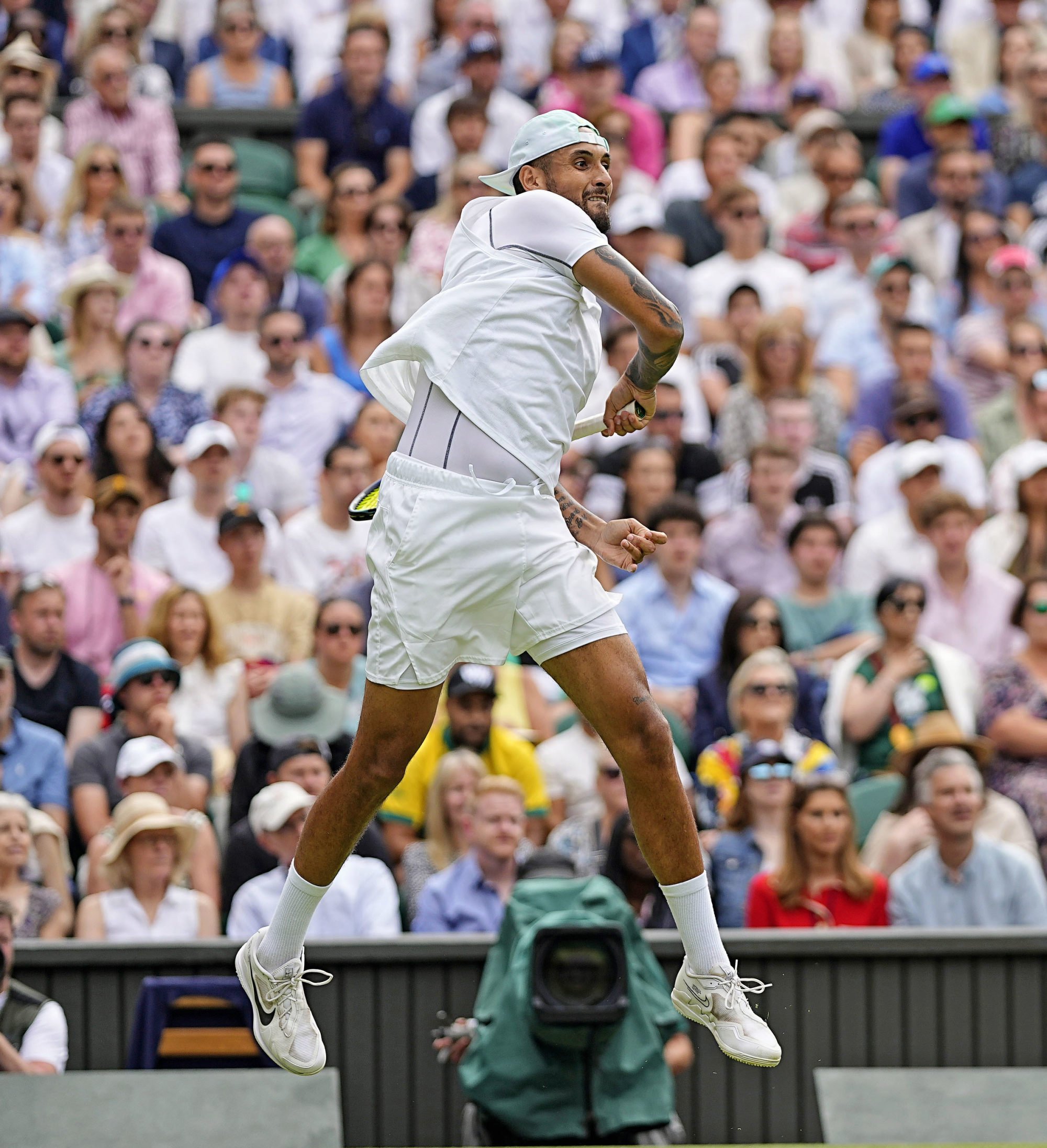 A well-behaved Nick Kyrgios defeated Brandon Nakashima in the fourth round of the Wimbledon. Photo: Kyodo