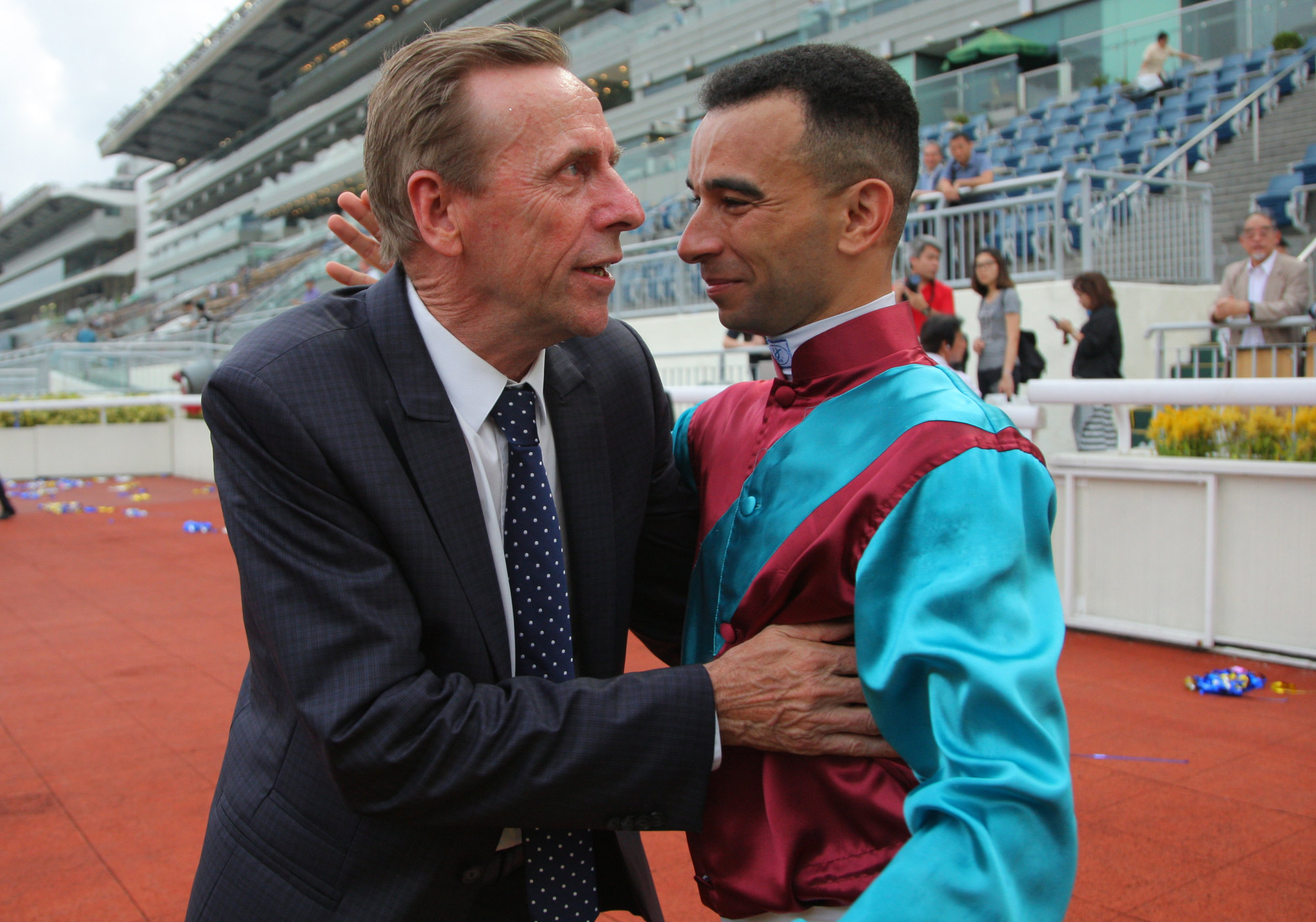 John Size (left) is congratulated by Joao Moreira after winning the 2018-19 trainers’ championship.