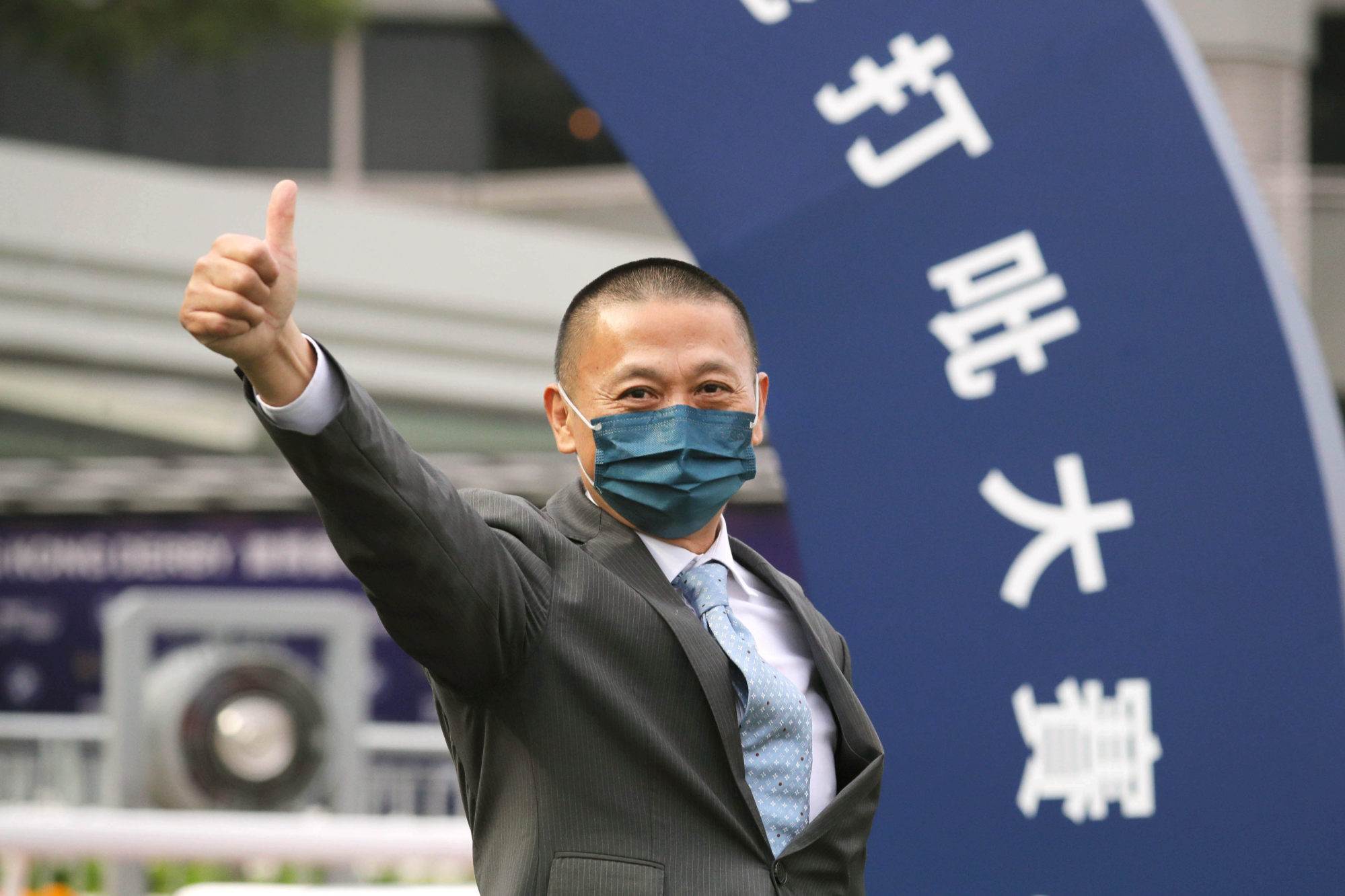 Danny Shum celebrates the Hong Kong Derby win of Romantic Warrior.