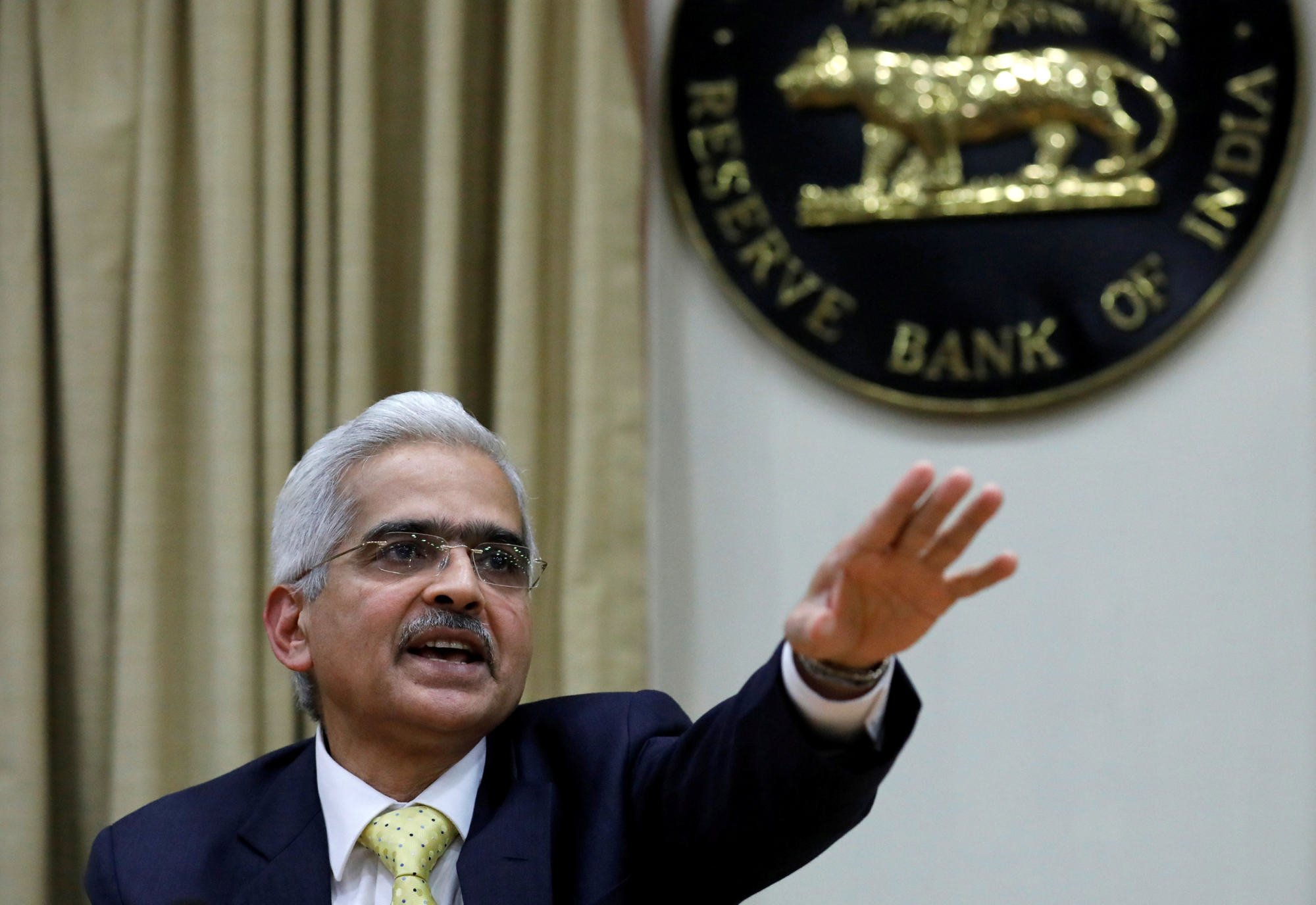 Shaktikanta Das, Reserve Bank of India governor, gestures during a news conference in Mumbai on December 12, 2018. India began raising interest rates in May. Photo: Reuters