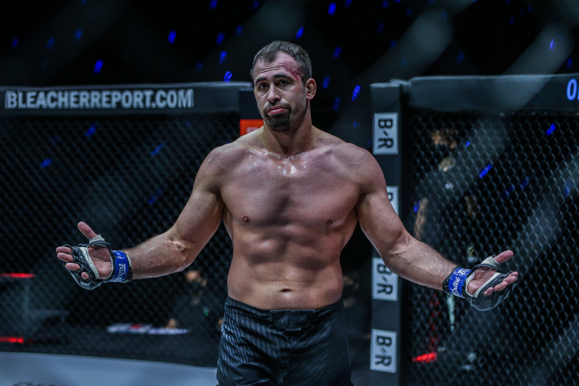 Kirill Grishenko reacts to a victory over Oumar Kane.