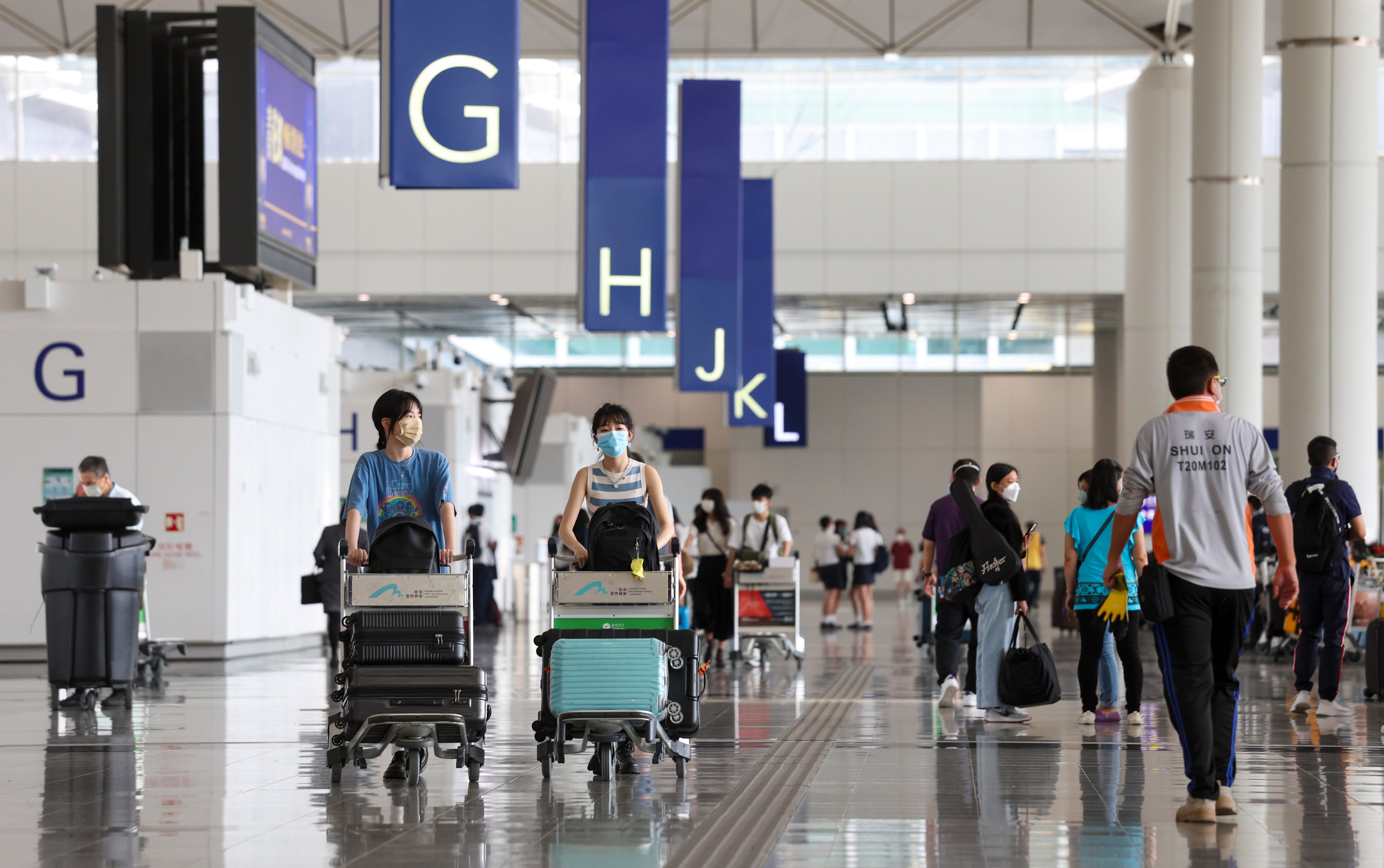 Travellers in the departure hall at Hong Kong International Airport on June 22, 2022. Photo: SCMP