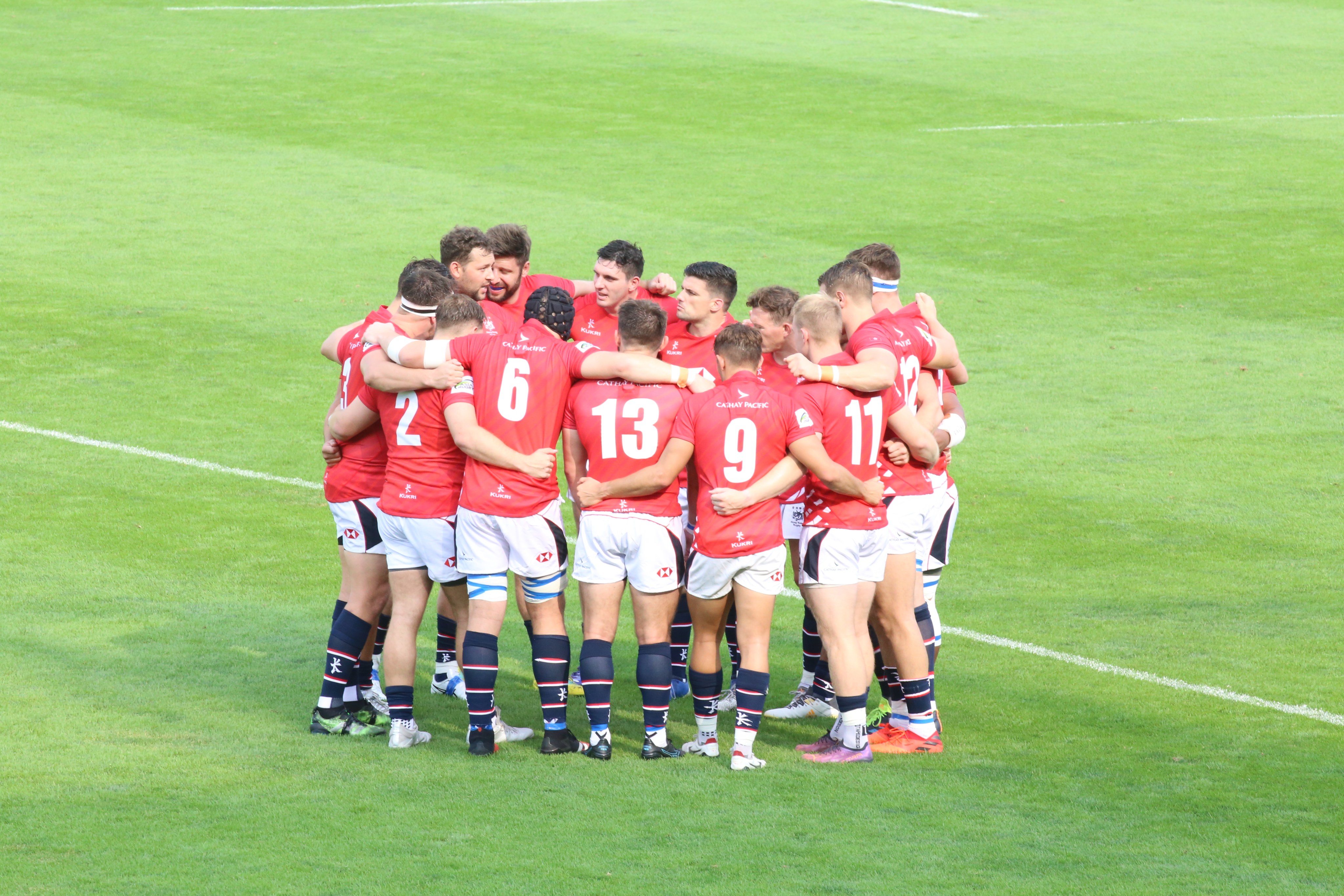 The Hong Kong team gather together for a final word before the start of their Asia Rugby Championship match against Korea. Photo: Asia Rugby 