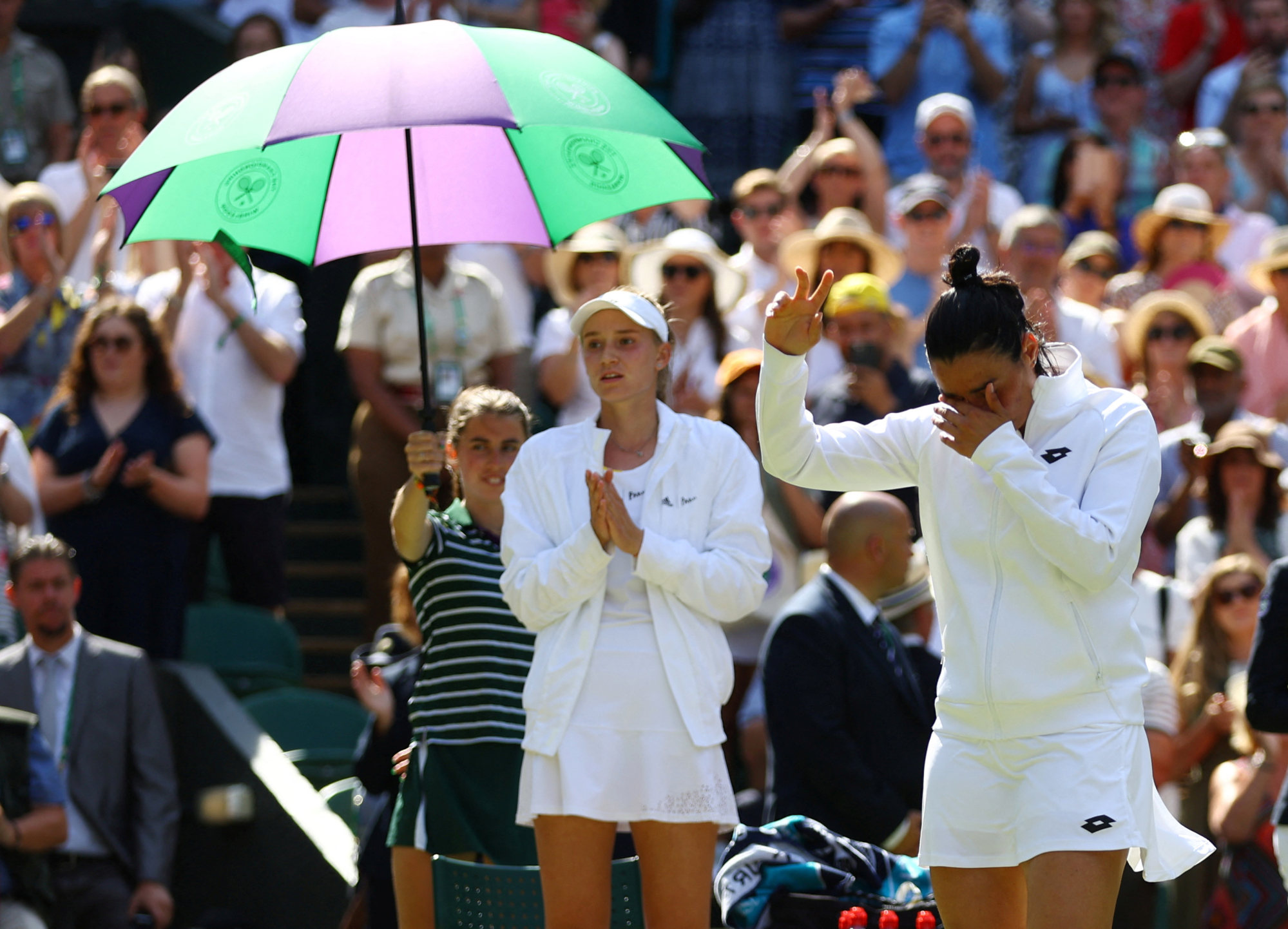 Tunisia’s Ons Jabeur, right, reacts after losing the women’s singles final as Kazakhstan’s Elena Rybakina looks on at Wimbledon, Britain on Saturday. Photo: Reuters