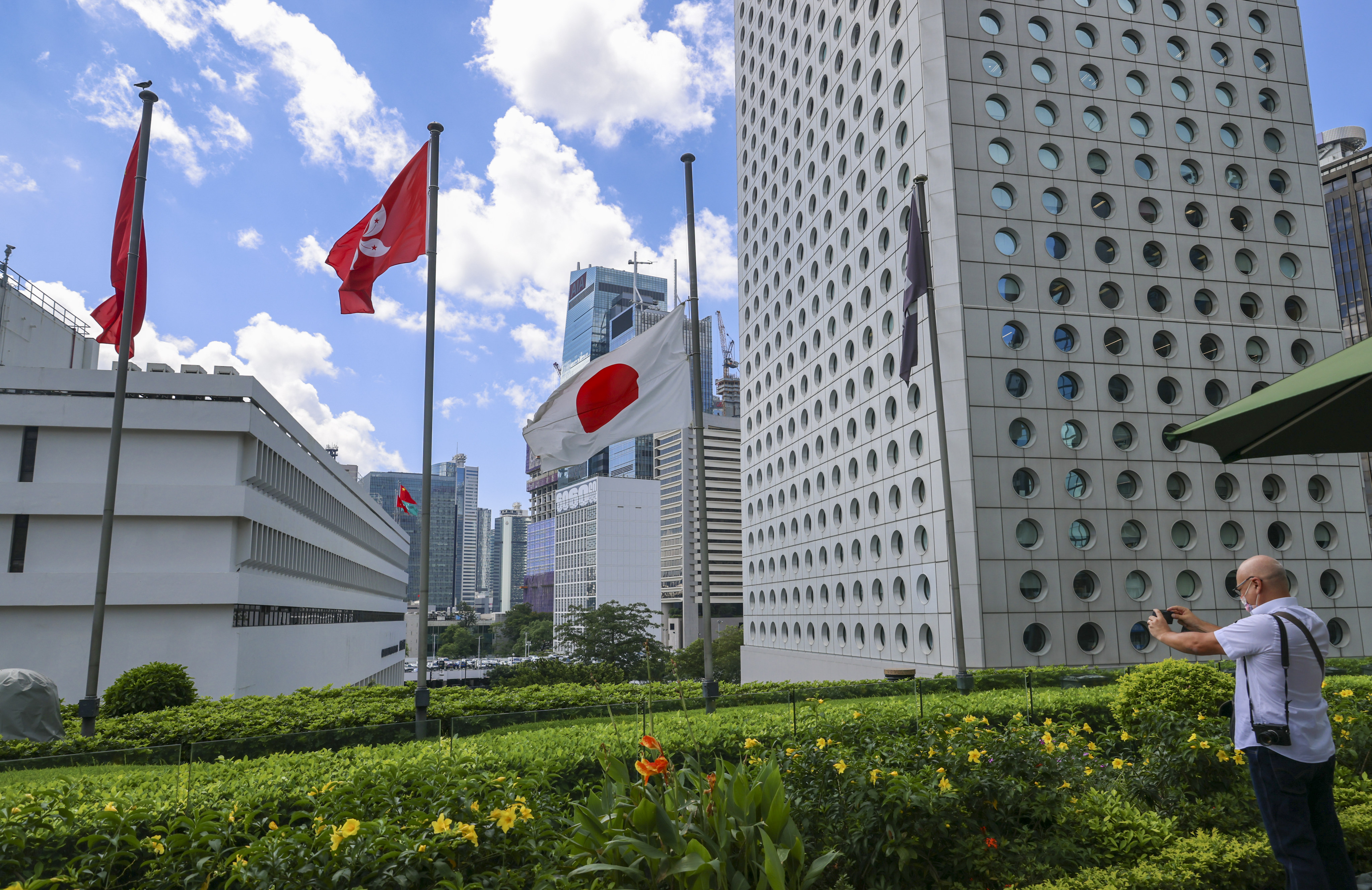 A Japanese flag flies at half-mast at Exchange Square in Central, the home of the Japanese consulate, to honour Shinzo Abe, a former prime minister who was murdered last week. Photo: Dickson Lee