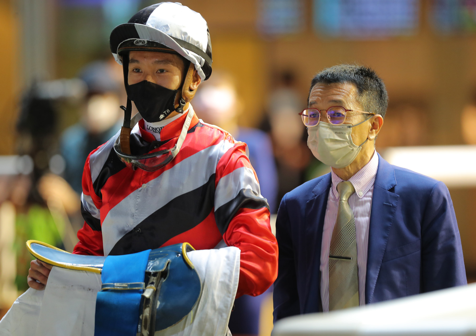 Me Tsui and Vincent Ho in the winner’s enclosure after the win of Wind Speeder.