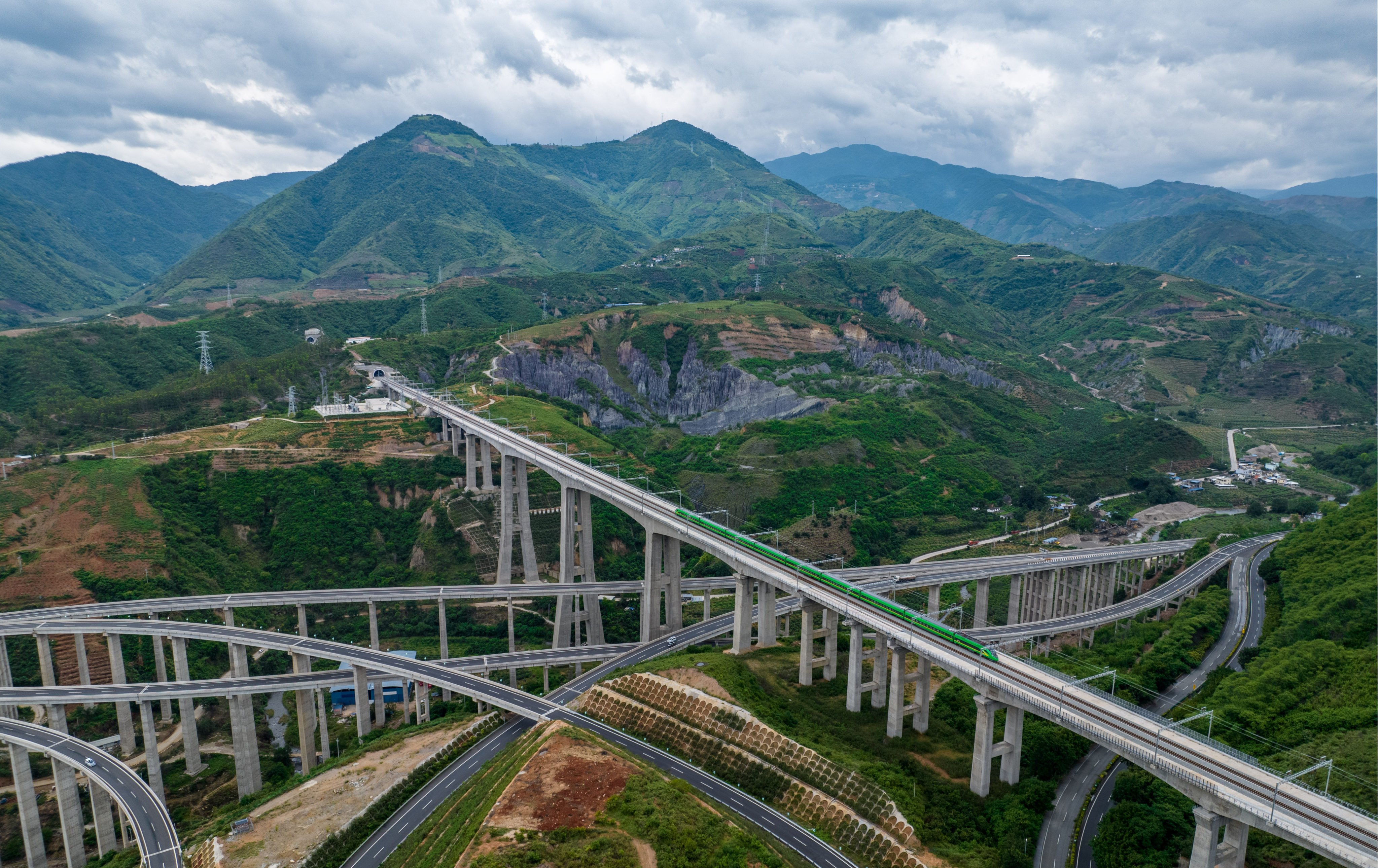 A Fuxing bullet train crosses the Nanxihe grand bridge on the China-Laos Railway in southwest China’s Yunnan province on June 2. China’s strength in high-speed rail construction would make it difficult for the US to compete in infrastructure funding in this area internationally. Photo: Xinhua