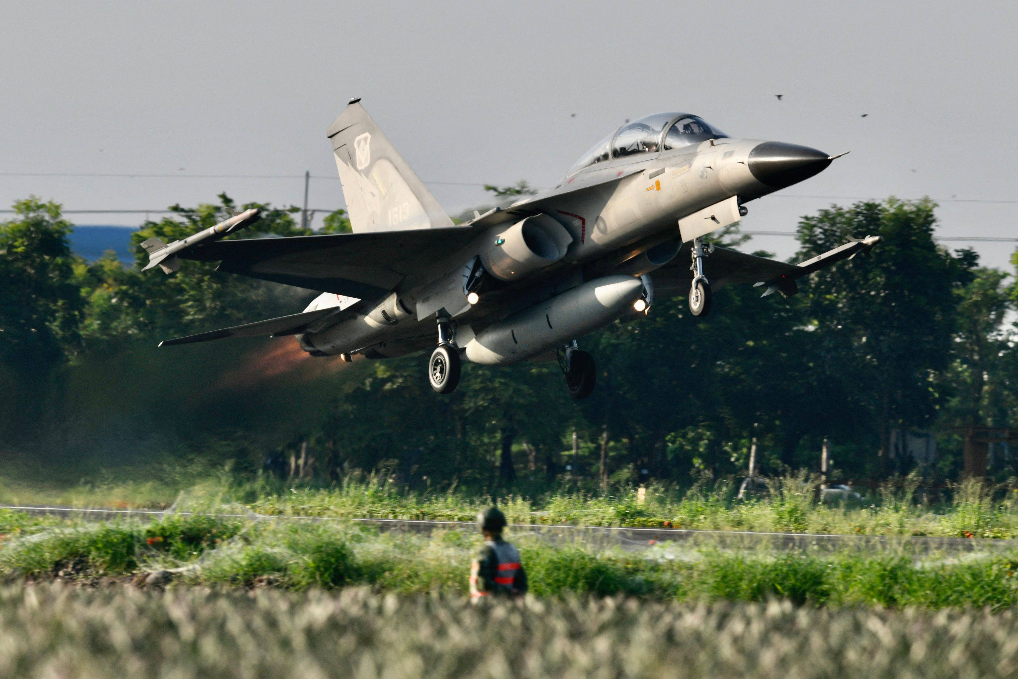 An indigenous defence fighter jet takes off from a motorway in Pingtung, southern Taiwan, during the last Han Kuang military drill in September. Photo: AFP