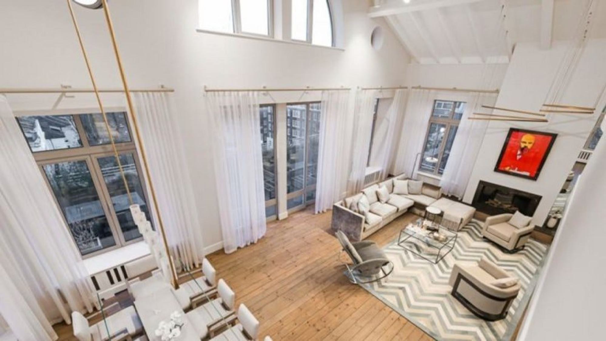 A peek inside Ruja Ignatova’s Kensington flat, revealing a work by Andy Warhol over the fireplace. Photo: BBC News