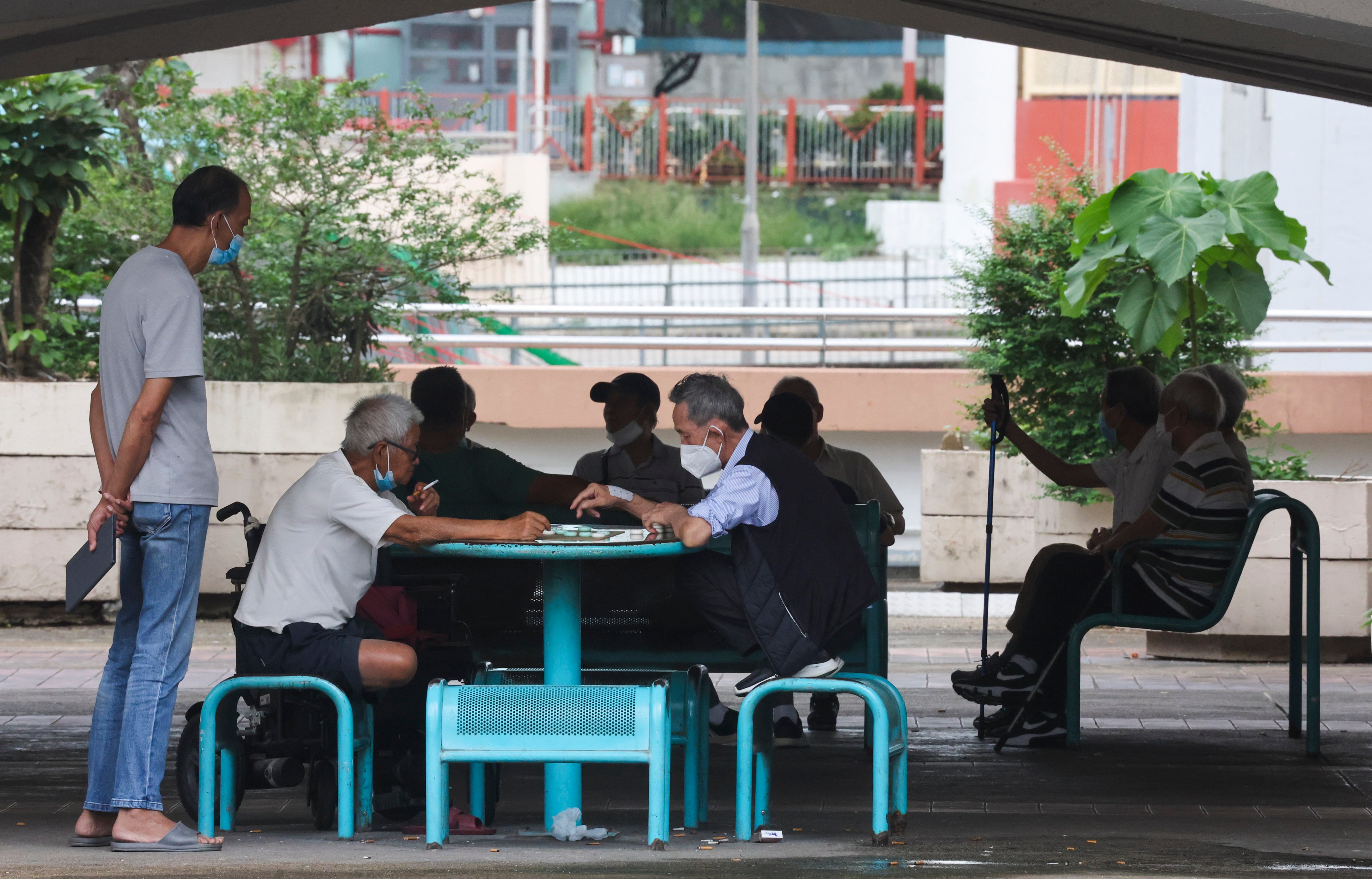 Elderly men gather in a public area in Choi Wan Estate, Wong Tai Sin District, on June 20. Photo: Edmond So