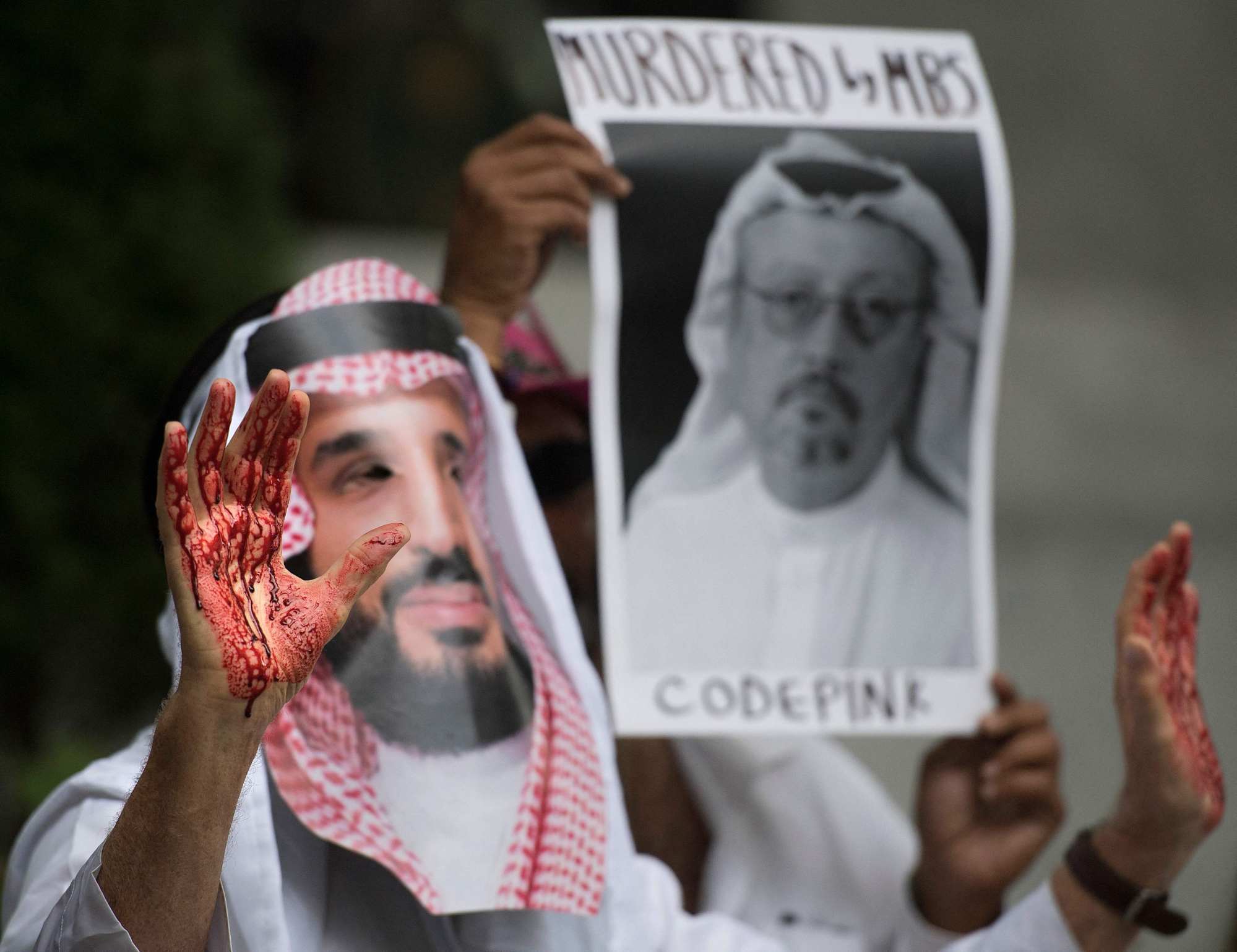 A demonstrator dressed as Saudi Crown Prince Mohammed bin Salman with blood on his hands protests against the killing of Jamal Khashoggi in Washington in 2018. Photo: AFP