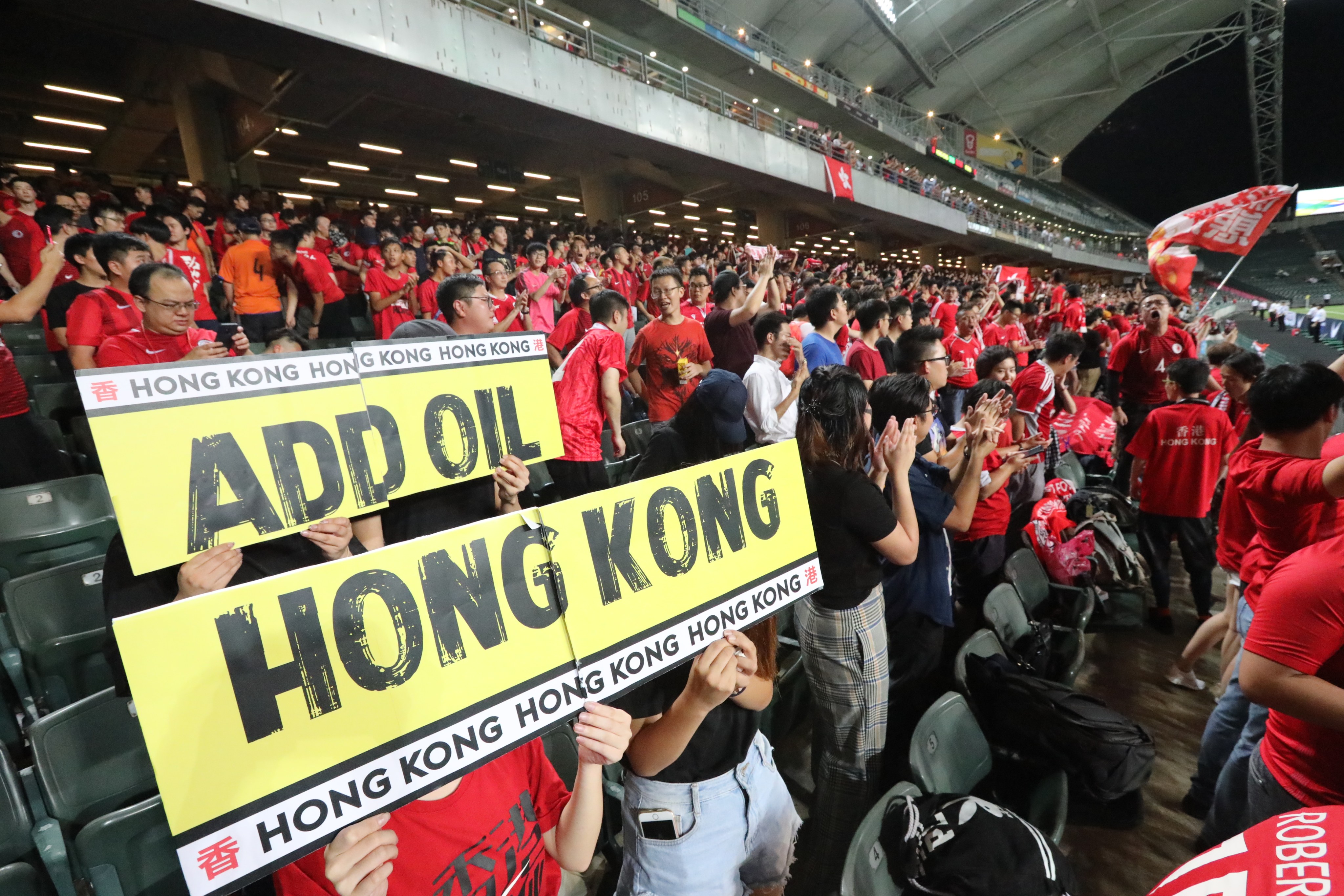 Football fans with an “add oil, Hong Kong” sign at the Hong Kong vs Iran 2022 Fifa World Cup qualifying match in Happy Valley, Hong Kong. Hongkongers should retake ownership of the phrase, which has recently been associated with anti-government protesters. Photo: Felix Wong