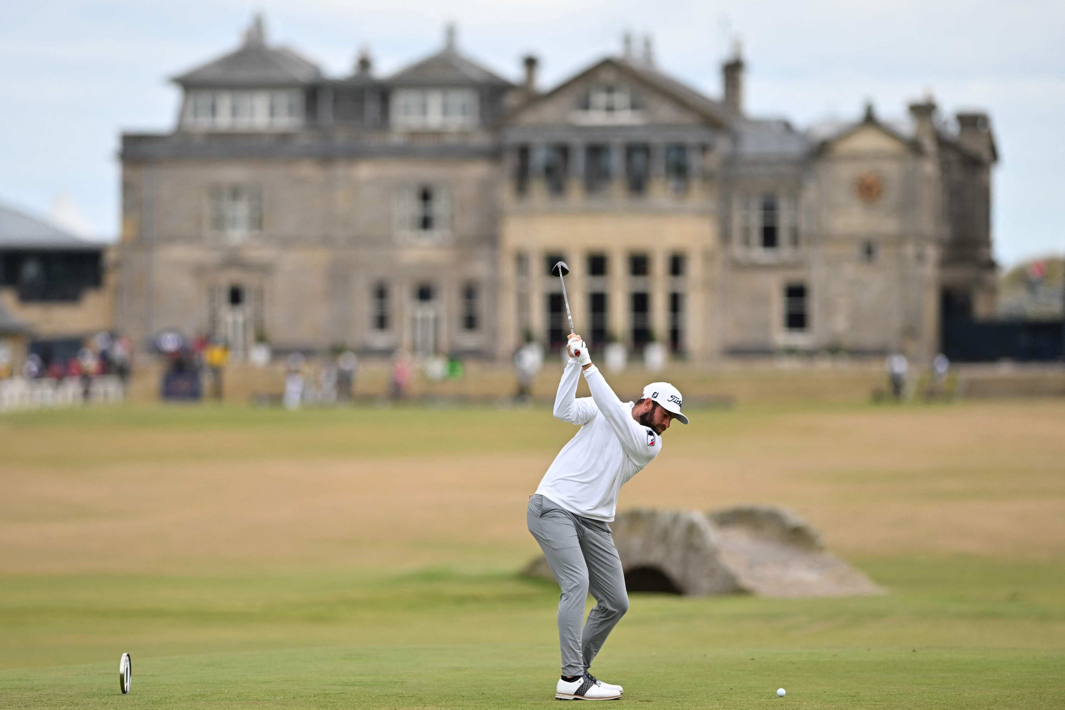 Cameron Young plays from the 18th tee during his opening round 64 on the first day of The 150th Open Championship at St Andrews. Photo: AFP