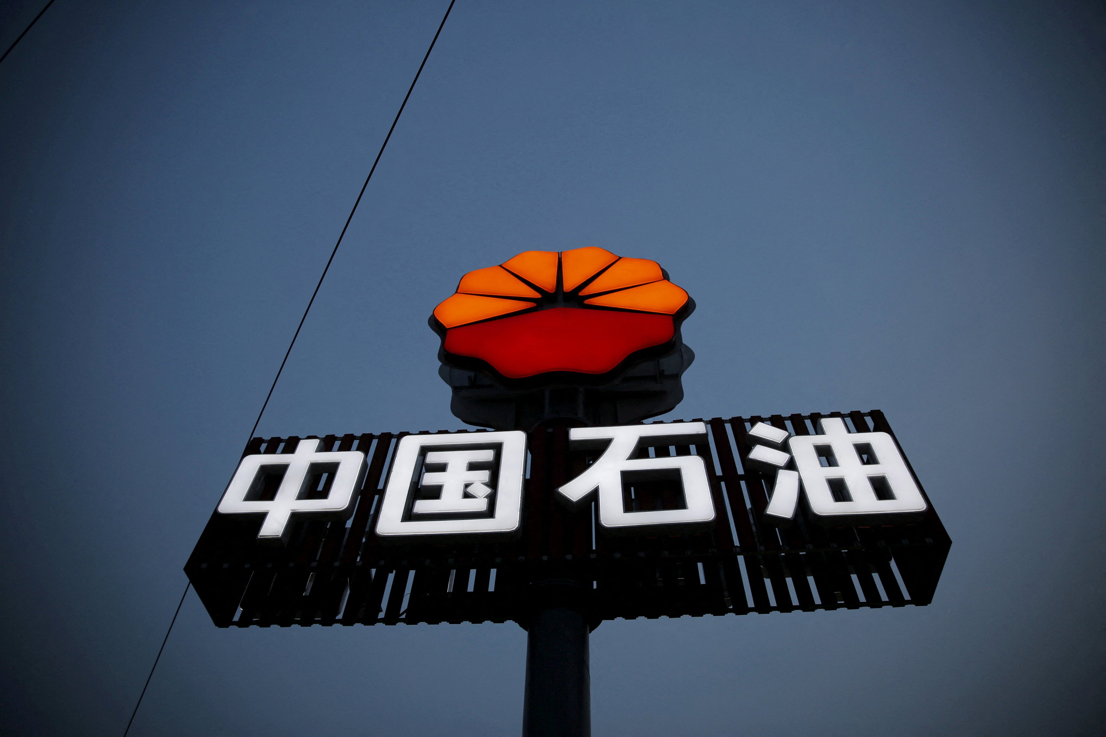 PetroChina’s logo is seen at a petrol station in Beijing. China’s largest oil and gas producer saw its first-half net profit jump due to higher oil prices. Photo: Reuters