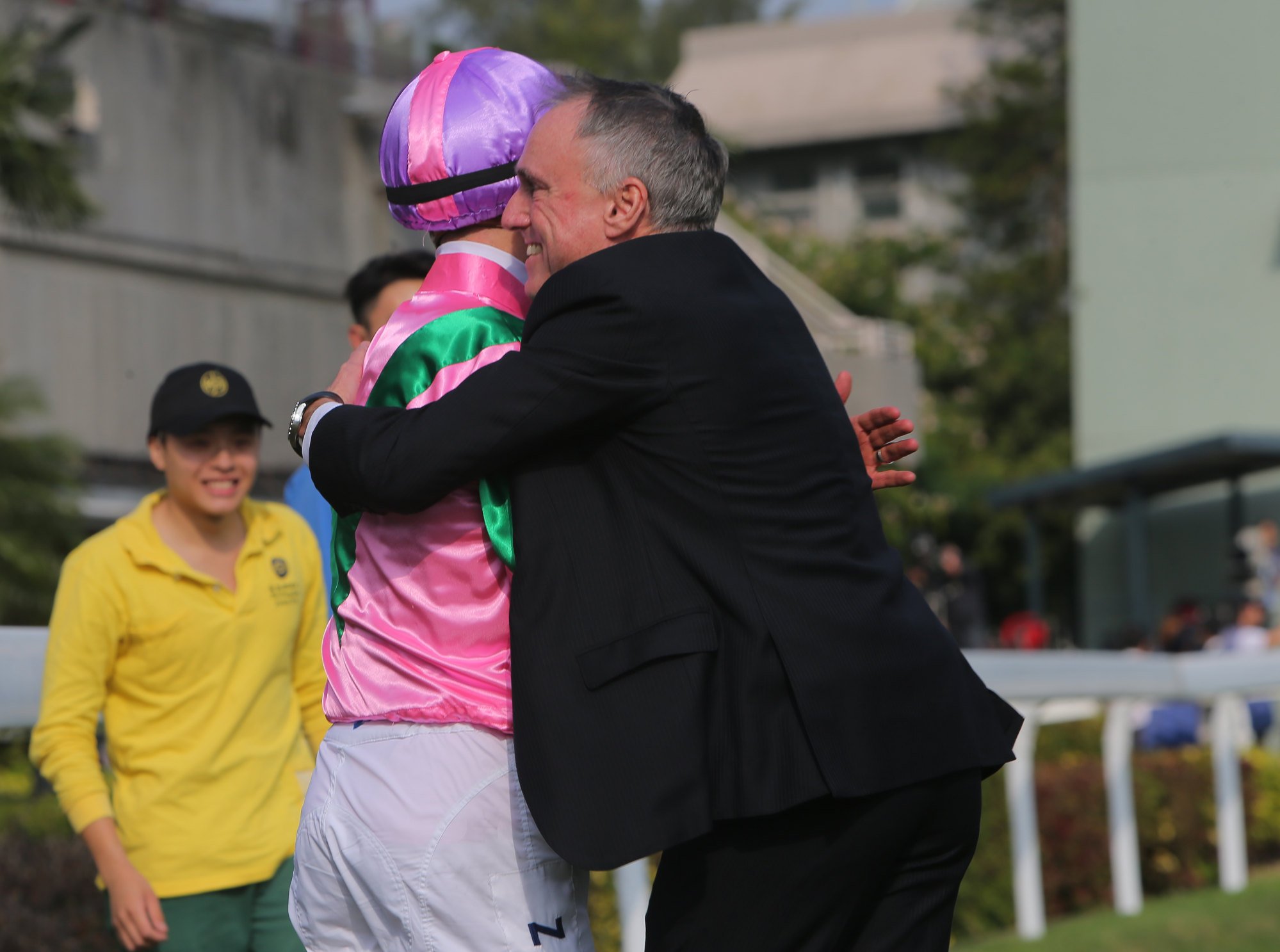 Trainer Paul O’Sullivan gives jockey Zac Purton a hug after Aerovelocity’s win in the 2016 Hong Kong Sprint.