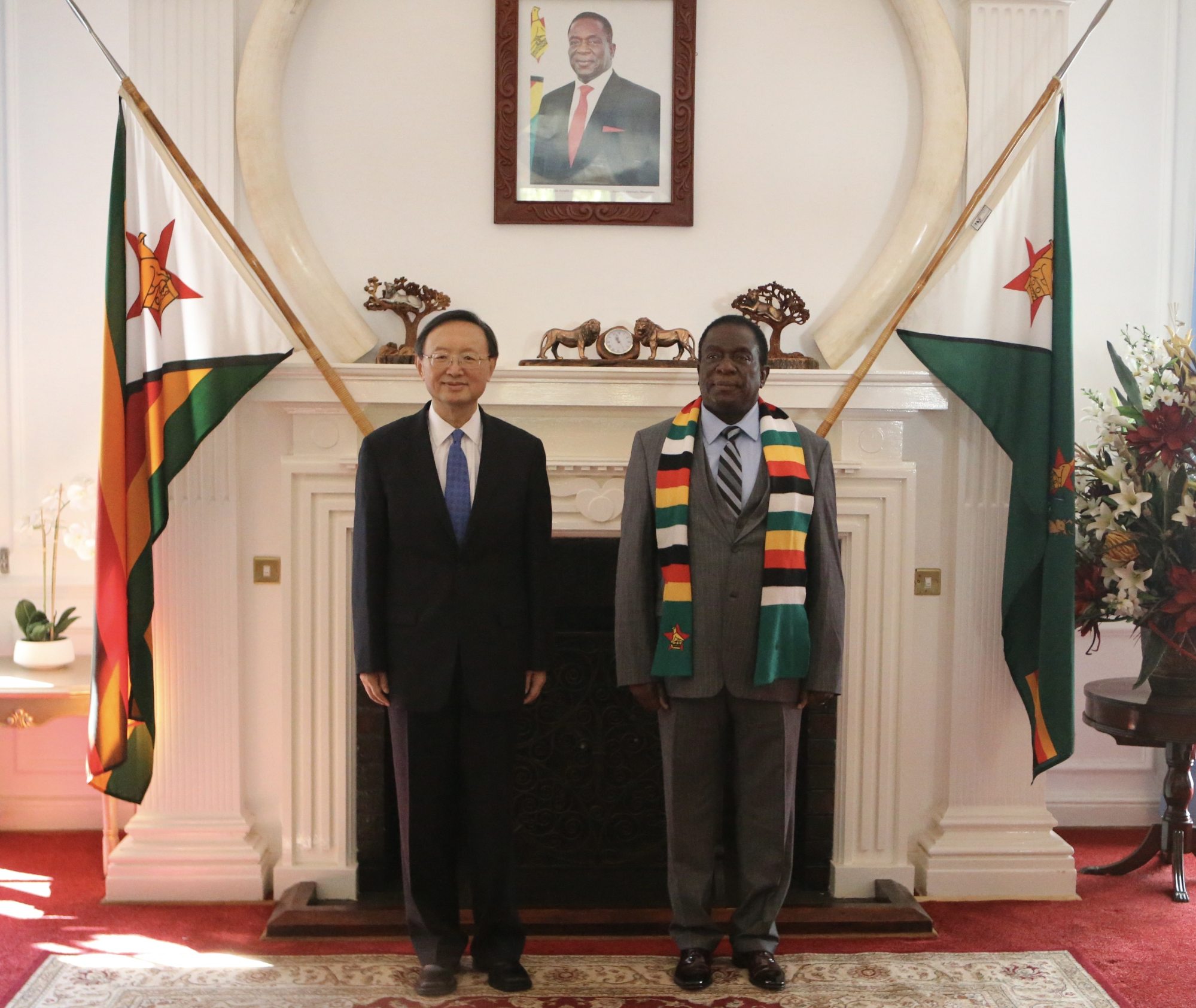 Zimbabwean President Emmerson Mnangagwa with Yang Jiechi in Harare on July 3. Photo: Xinhua
