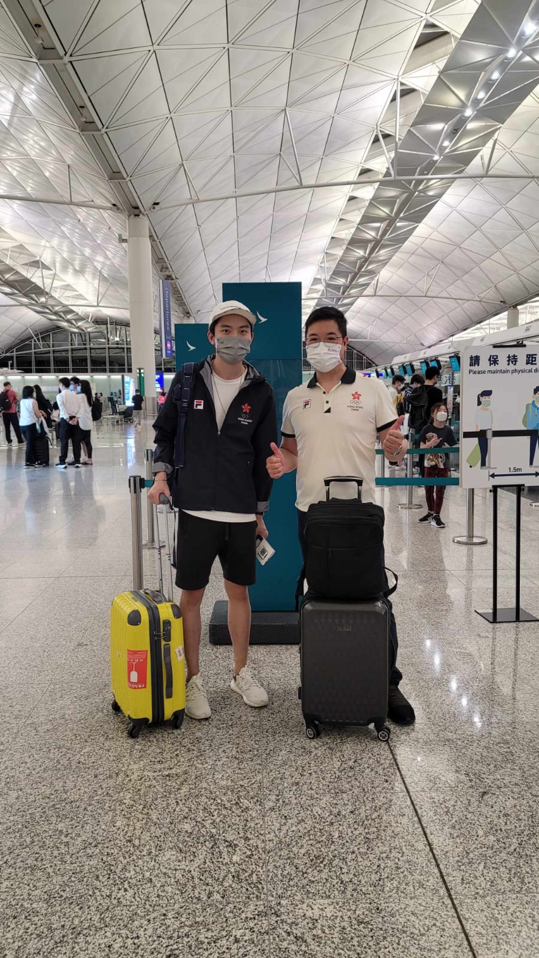 Cheung Ka-wai (left) and coach Alan Wong pose for a picture before their flight to Alabama. Photo: Handout