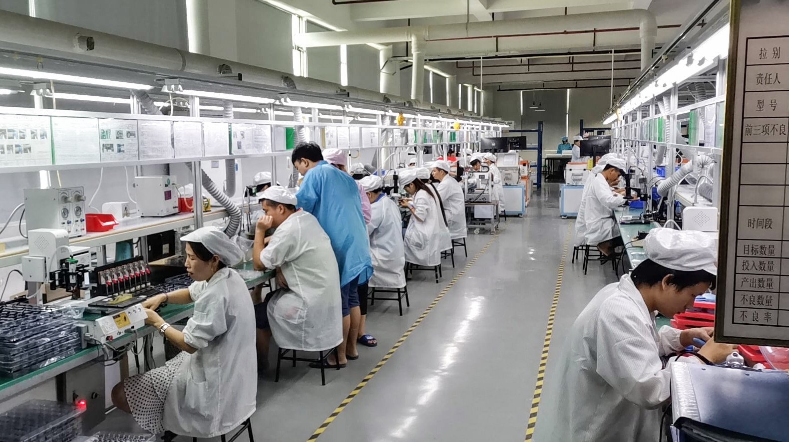 A production line inside the factory of Dongguan Koppo Electronics Co, a major Bluetooth headphone maker in China. Photo: Handout