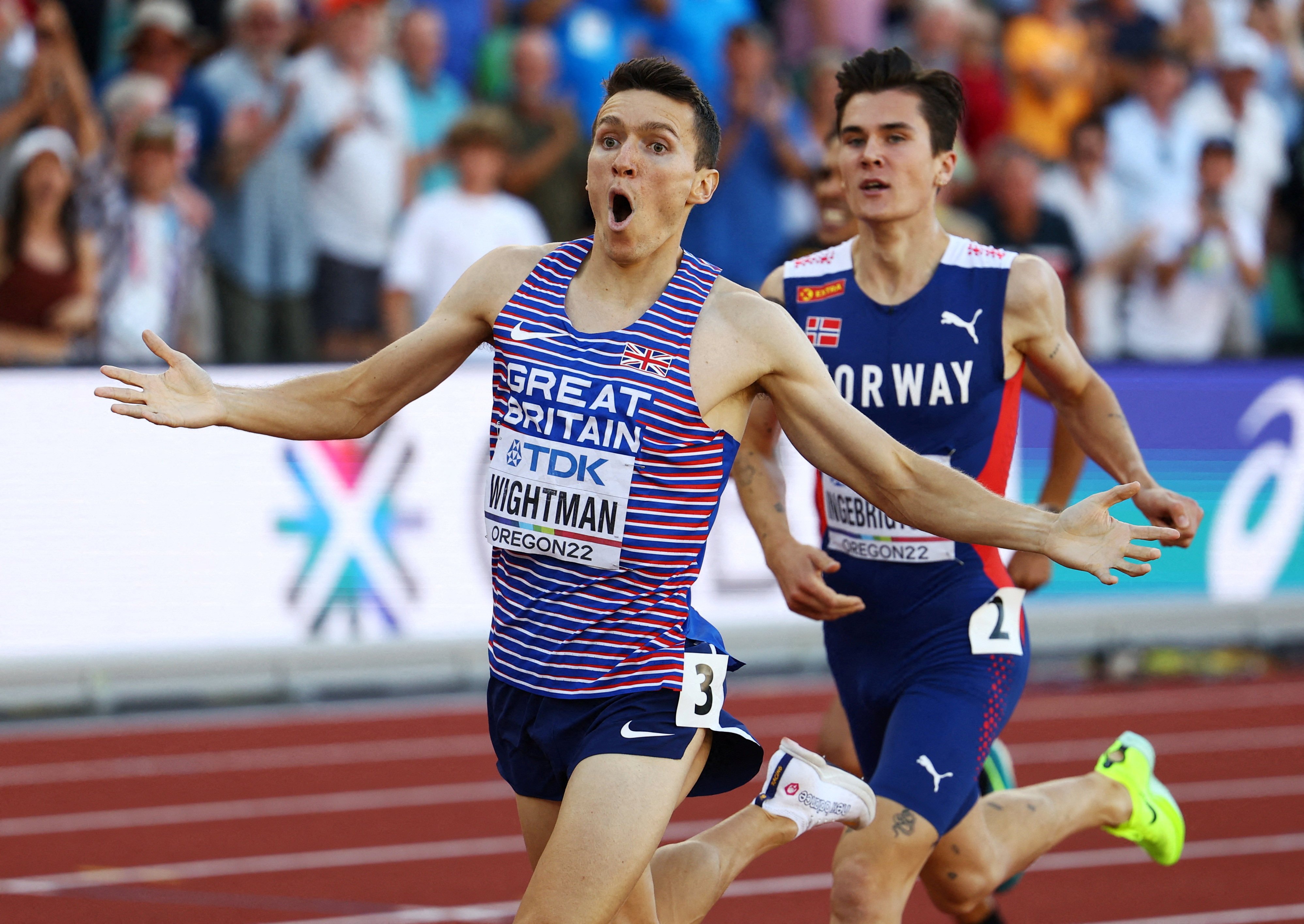 Britain’s Jake Wightman crosses the line to win the men’s 1,500 metres final. Photo: Reuters