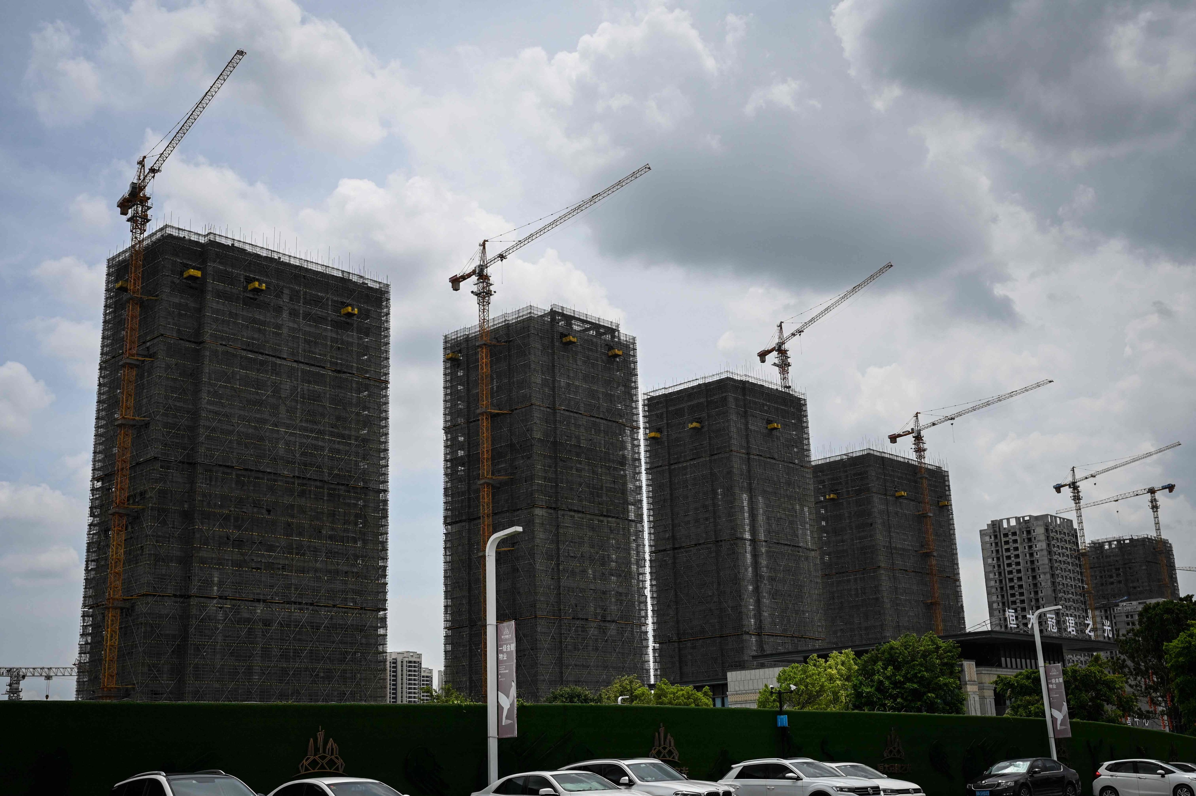Residential buildings under construction in Guangzhou on July 18. Infrastructure investment is a central part of China’s attempt to revive slowing growth, but returns on that investment are not as good as in previous decades. Photo: AFP