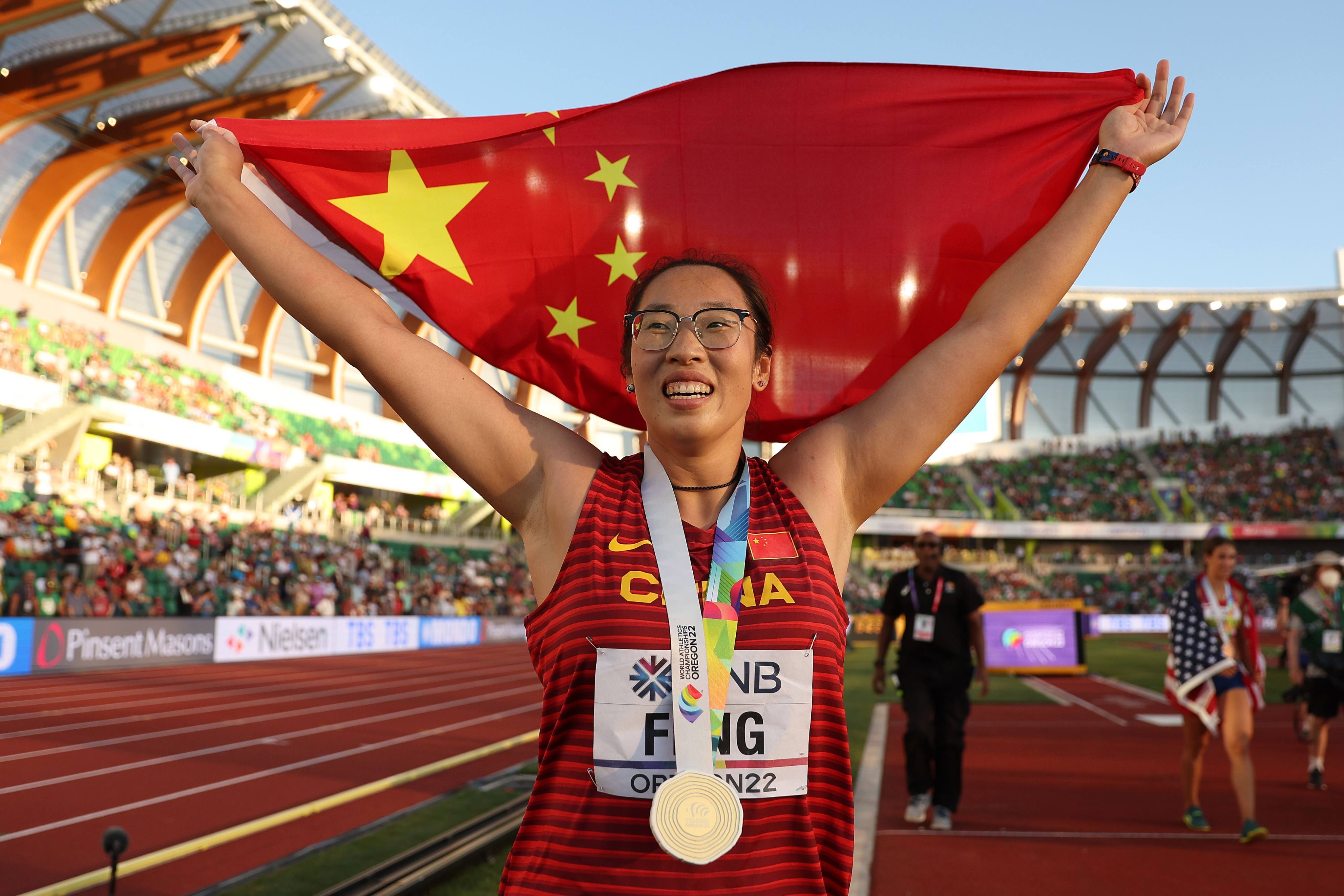 China’s Feng Bin celebrates after winning gold in the women’s discuss at the World Athletics Championships. Photo: AFP
