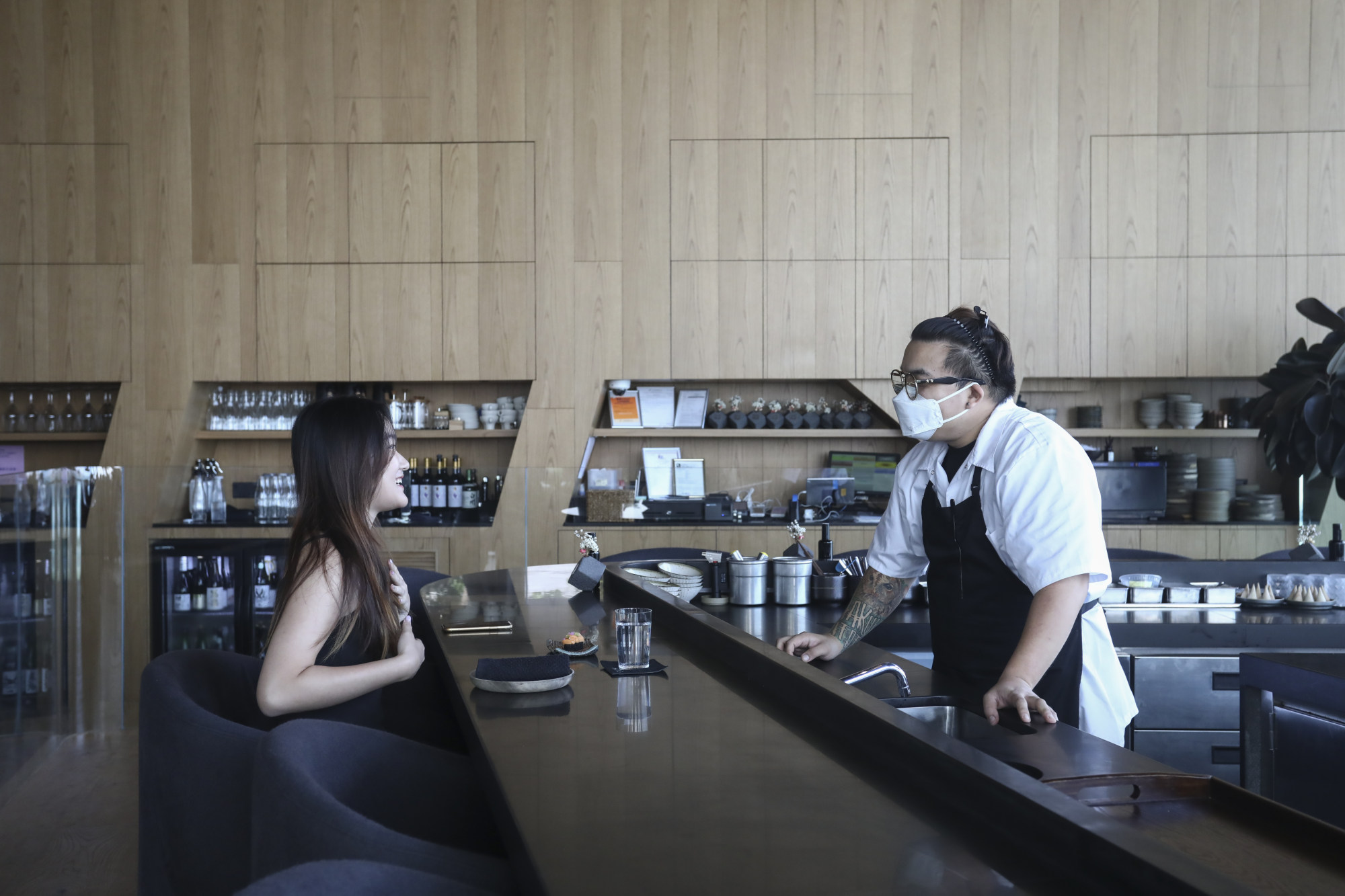 Guests can engage with the chef and the team at eye level thanks to the difference in floor height. Photo: Jonathan Wong