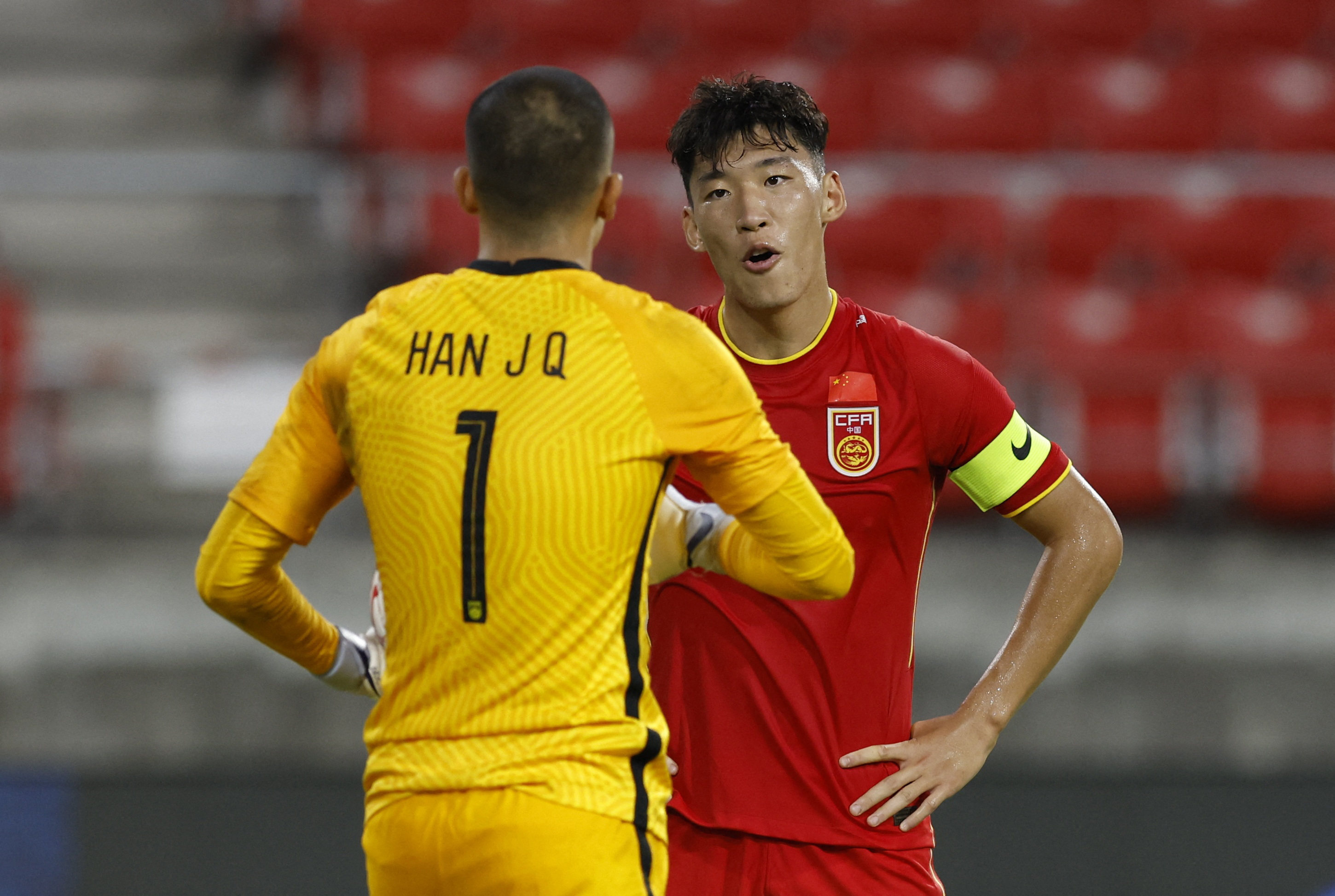 China’s Zhu Chenije (right) talks to goalkeeper Han Jiaqi after scoring an own goal against South Korea. Photo: Reuters