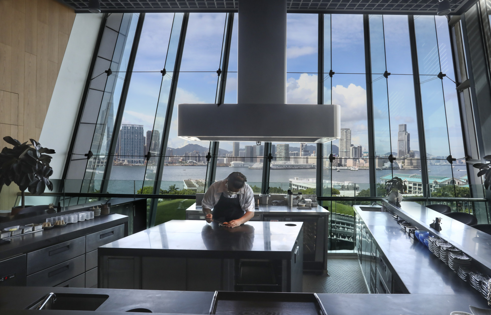 Dix’s design places Haku’s chefs centre stage – diners sit at a counter facing an open, sunken kitchen. Photo: Jonathan Wong