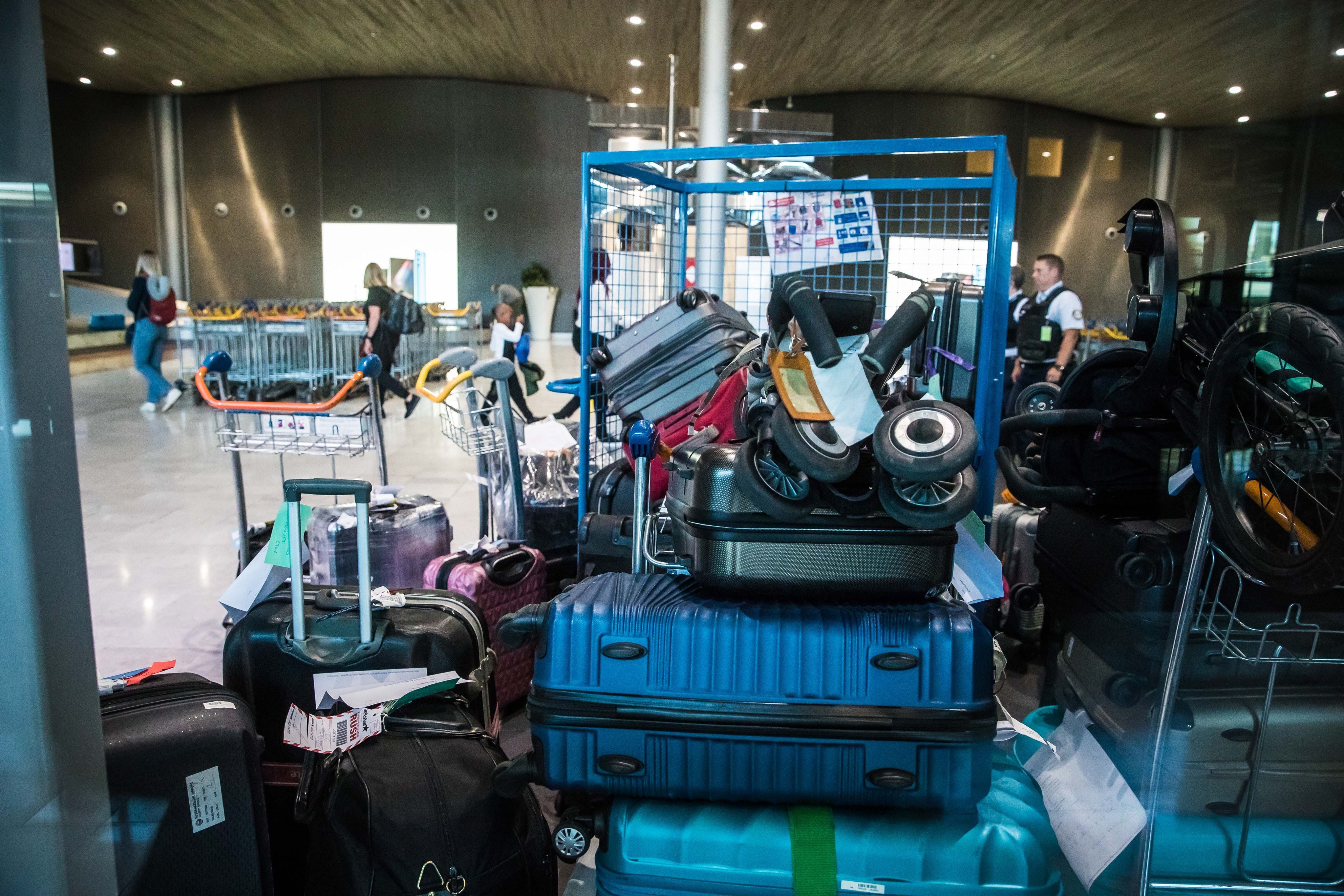 Baggage piles up at Roissy Airport outside Paris. Photo: EPA-EFE