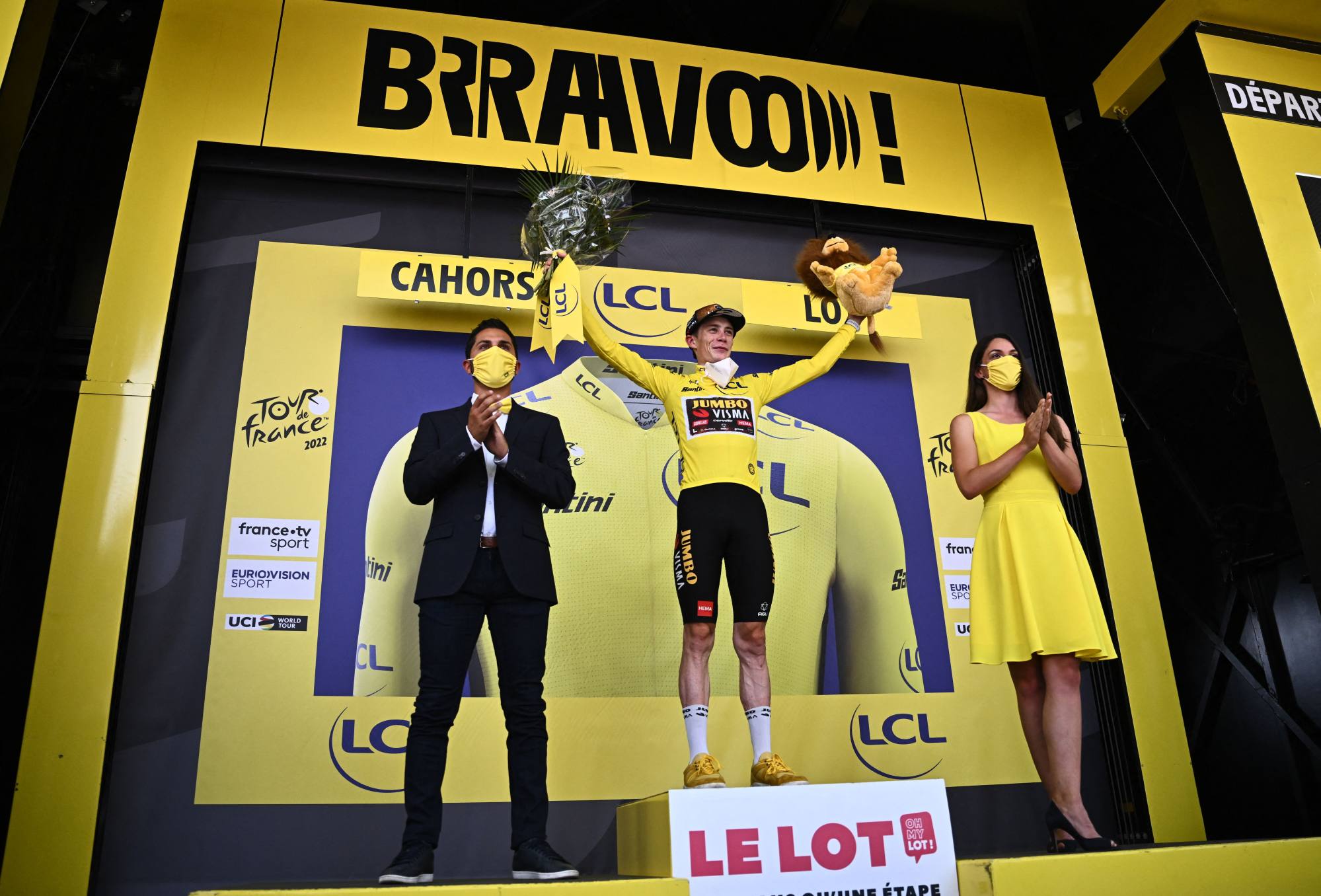Jumbo-Visma team’s Danish rider Jonas Vingegaard celebrates on the podium with the overall leader’s yellow jersey. Photo: AFP