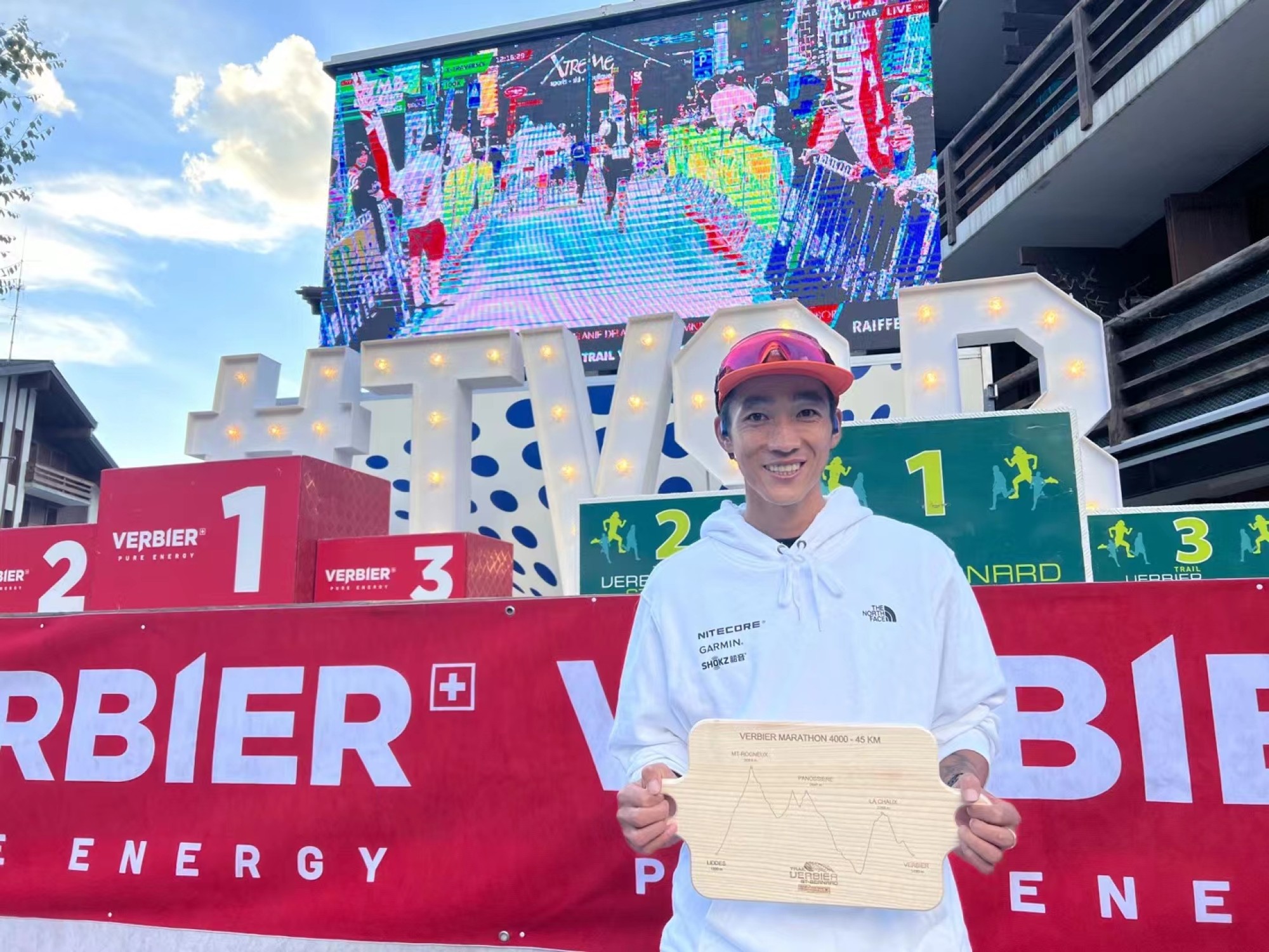 Shen Jiasheng holds his ‘vegetable cutting board’ trophy at the Trail Verbier St-Bernard by UTMB. Photo: Handout