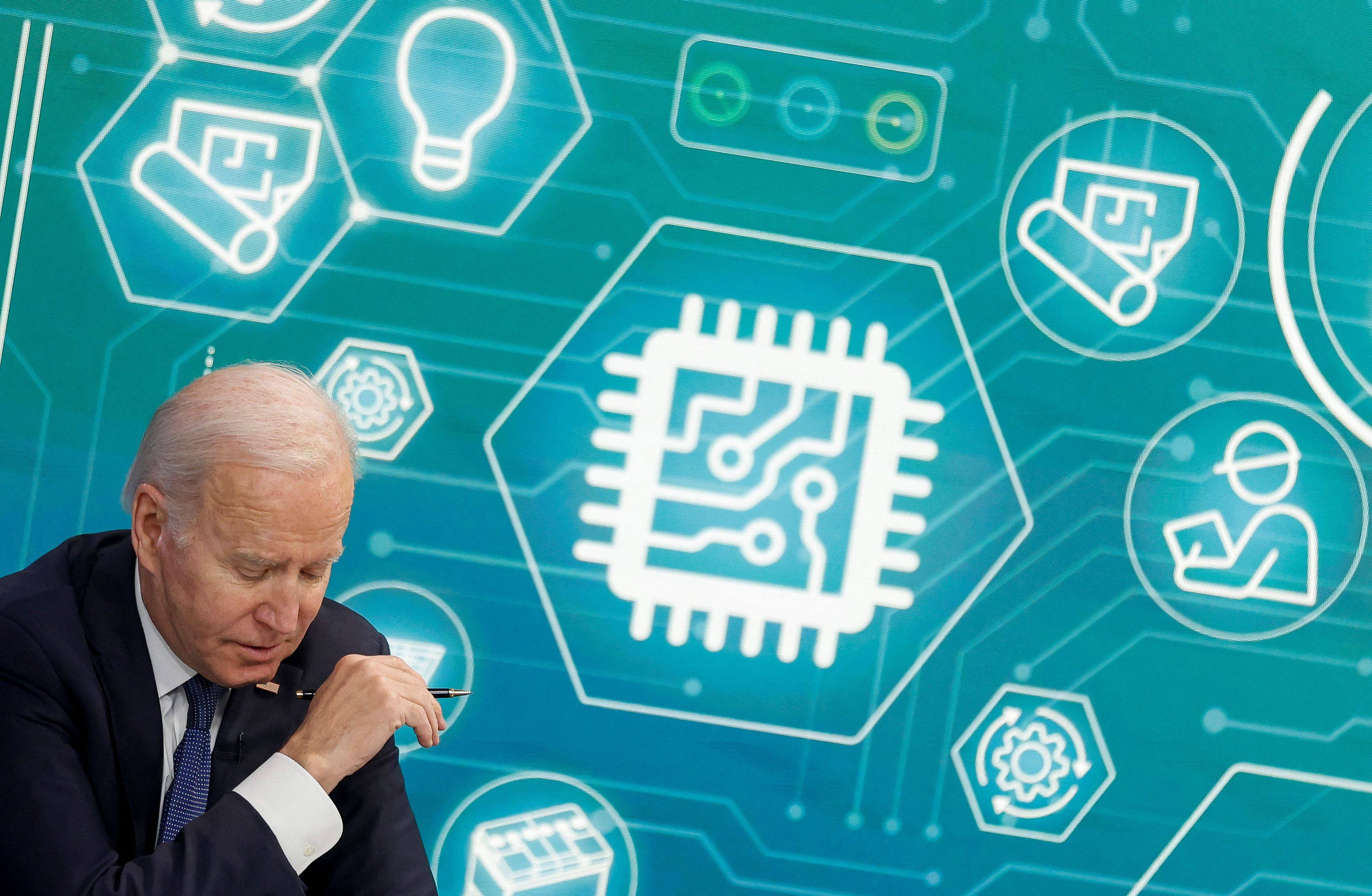 US President Joe Biden and Commerce Secretary Gina Raimondo (not pictured) hold a virtual meeting with business leaders and state governors to discuss supply chain problems, particularly addressing semiconductor chips, on the White House campus on March 9, 2022. Photo: Reuters