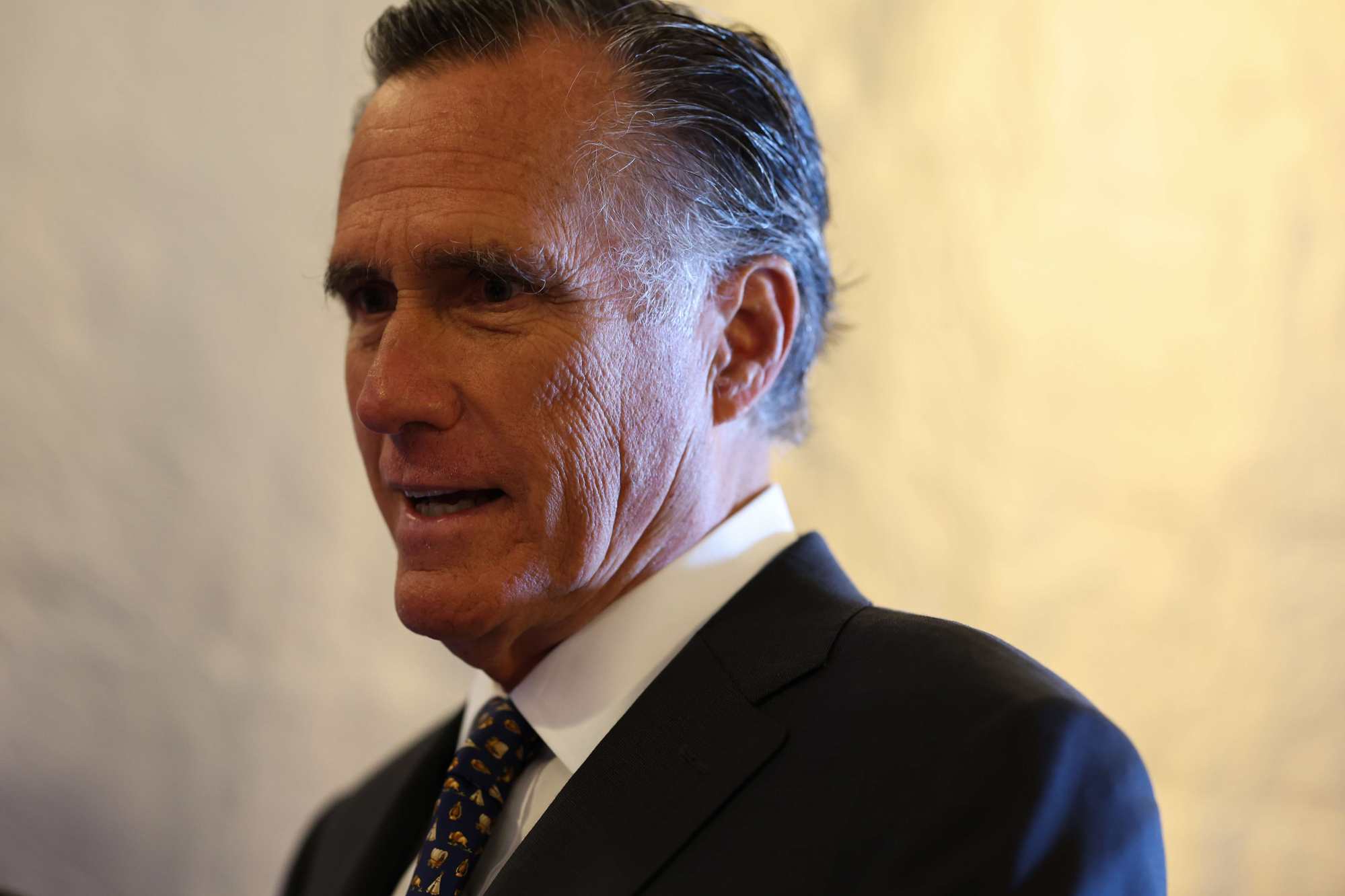 Senator Mitt Romney speaks to reporters outside the Senate Chambers in the US Capitol Building on July 21, 2022 in Washington. Photo: AFP