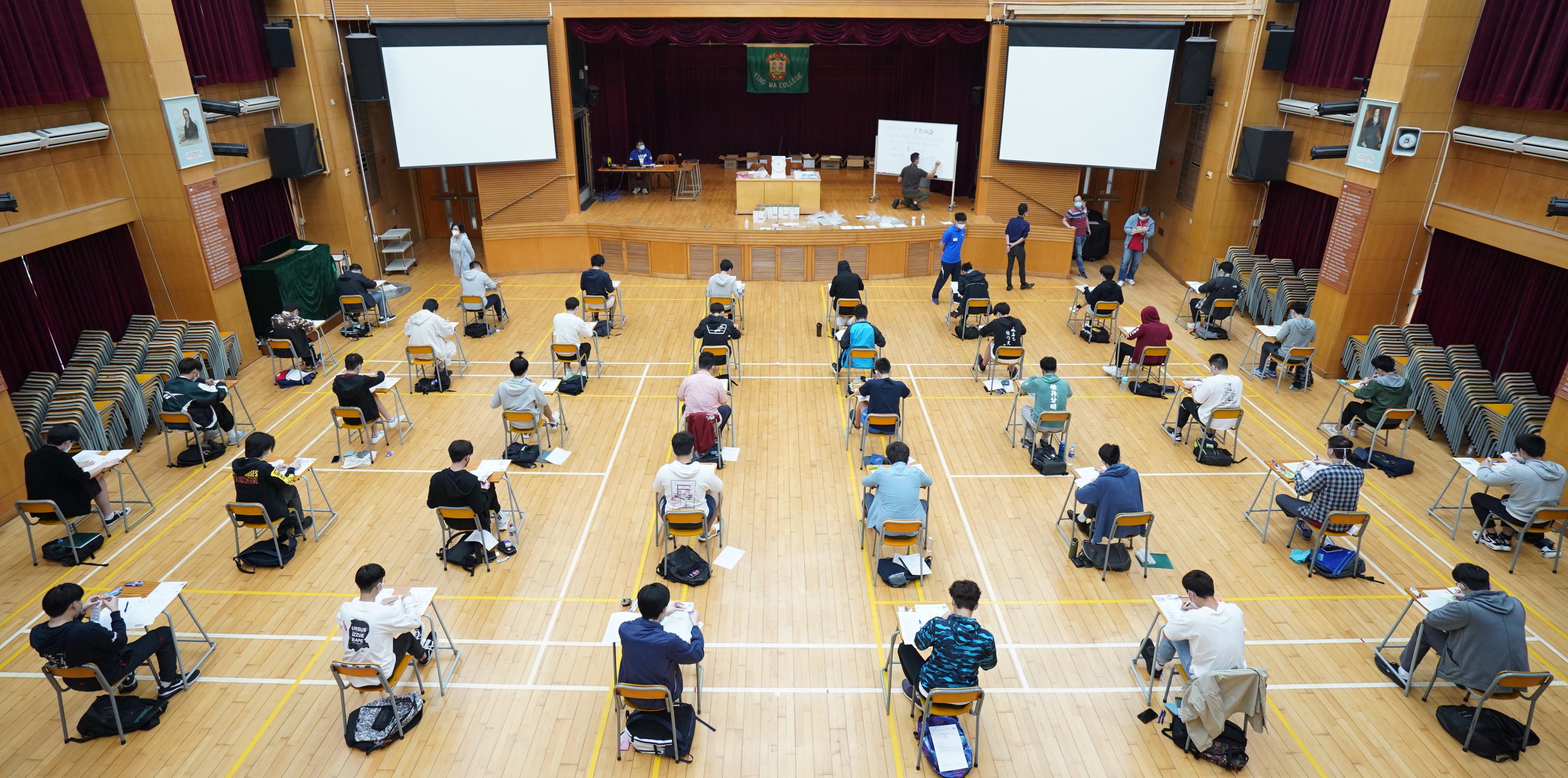 Diploma of Secondary Education candidates take the English exam on April 22 at Ying Wah College in Cheung Sha Wan. Photo: Handout