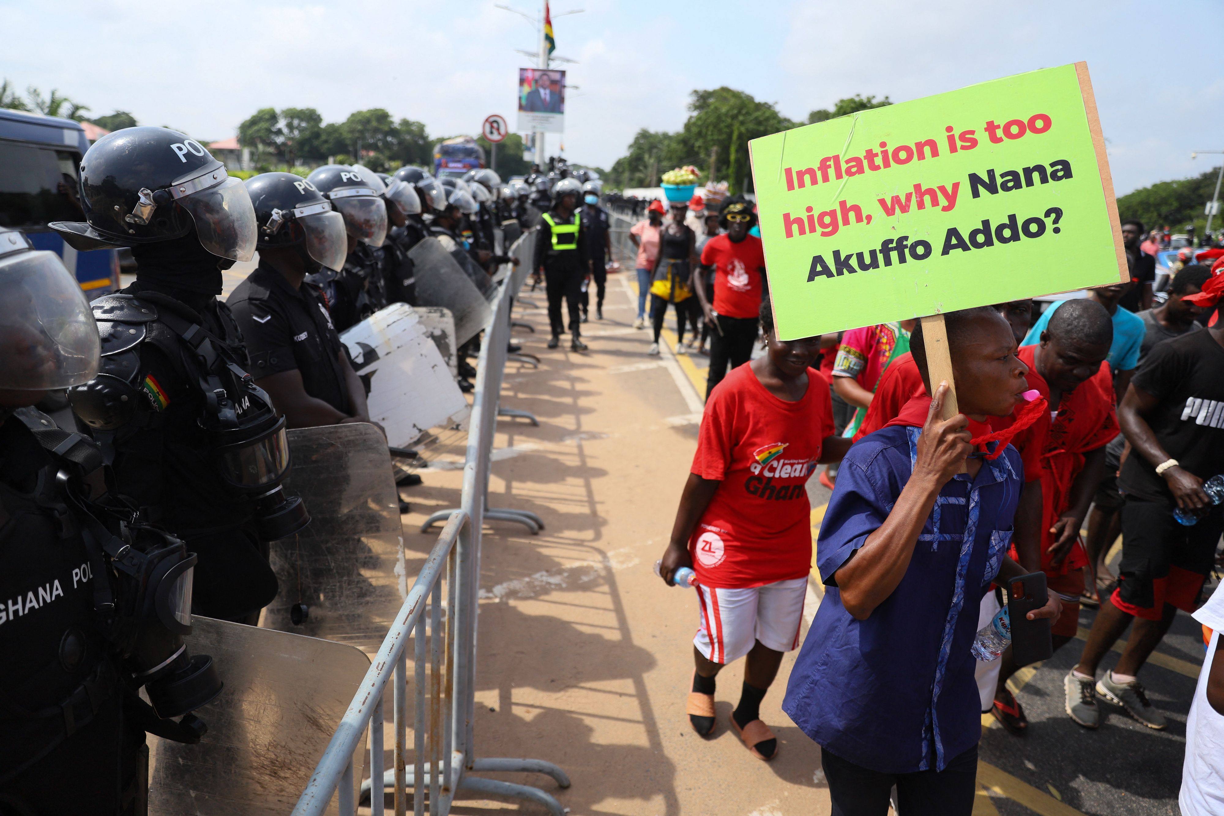 Protesters march towards the presidential palace on June 29 on the second day of a demonstration over soaring living costs in Accra, Ghana. Hit by the global pandemic and fallout from the war in Ukraine on fuel and food prices, Ghana is in talks with International Monetary Fund to help stabilise its public finances. Photo: AFP