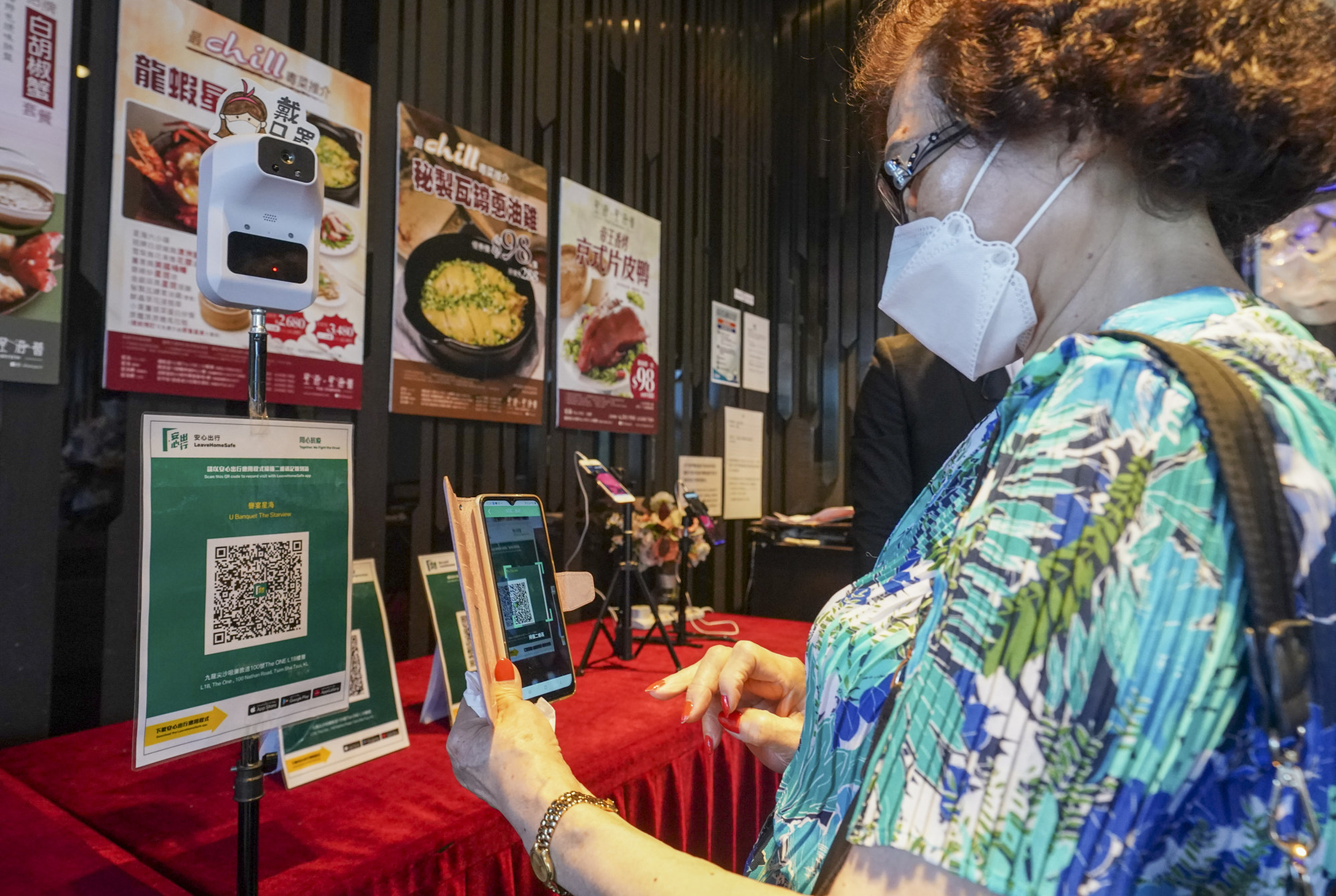 Hong Kong regulations, such as using the LeaveHomeSafe app to visit restaurants, are sometimes confusing. Photo: Felix Wong