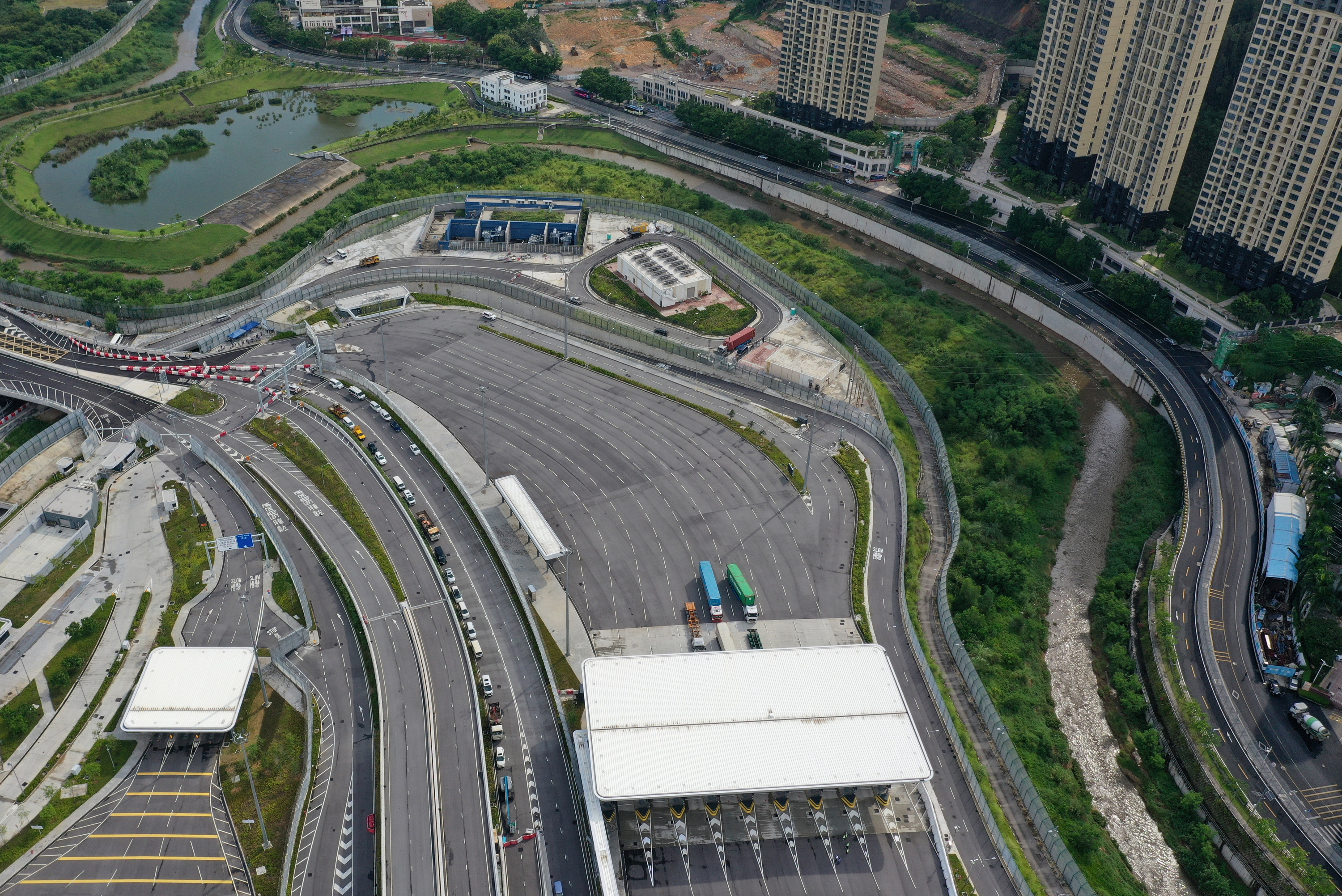 An aerial view of the Liantang Port/Heung Yuen Wai Boundary Control Point in the North District of the New Territories. To shrink the distance between Shenzhen and Hong Kong, the government should consider building a north-south rail line from the port to Siu Sai Wan. Photo: SCMP
