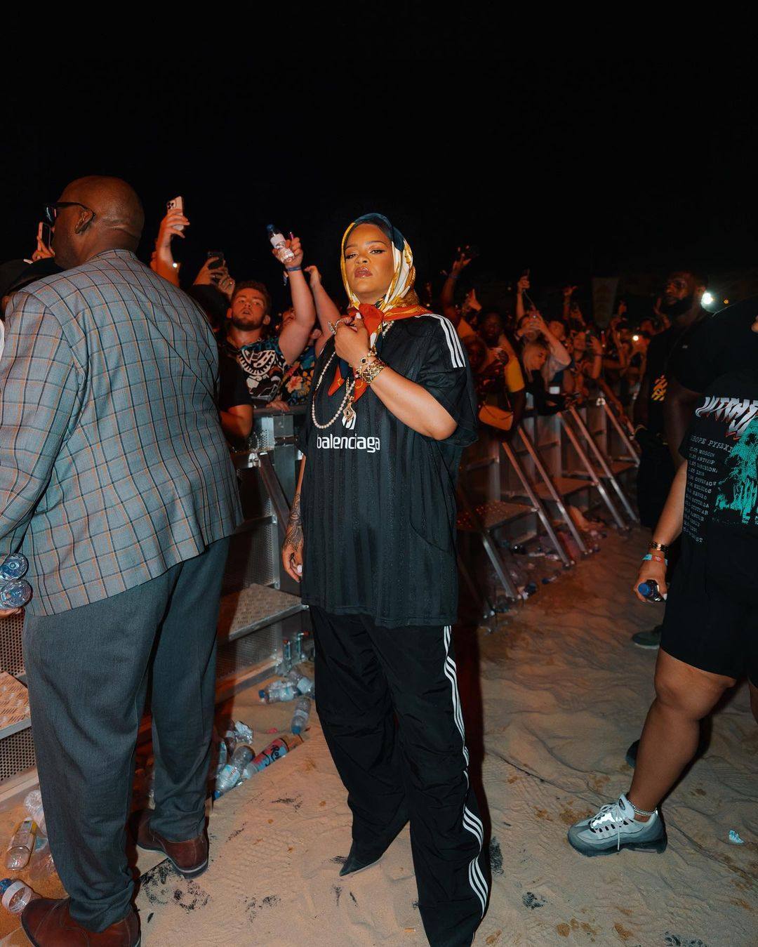 Rihanna at the Rolling Loud festival in Portugal in July wearing an oversized soccer shirt from a Balenciaga x Adidas collection. Together with fashion companies and social media, she is driving interest in a fashion look called blokecore. Photo: Instagram