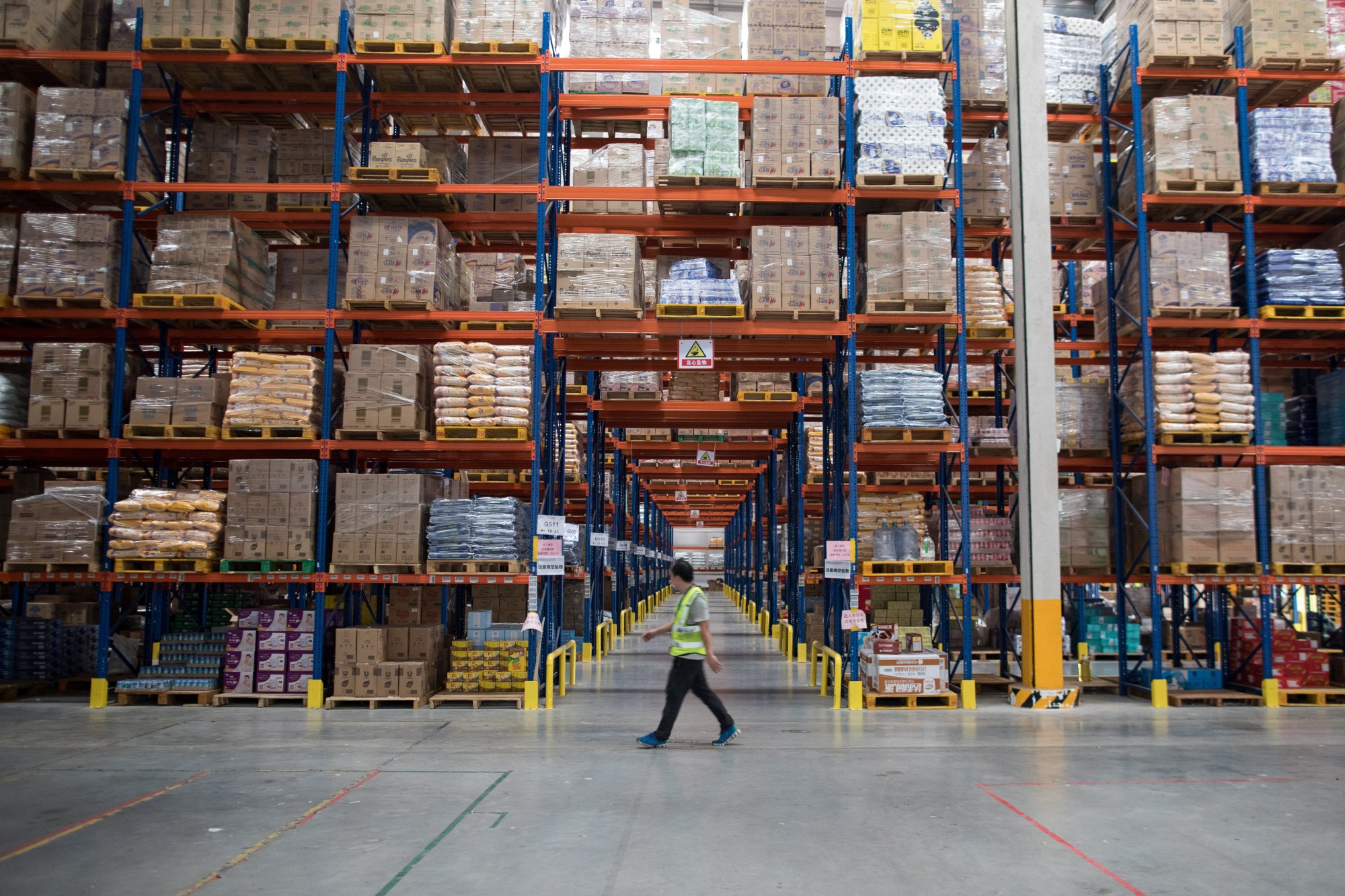 A Tmall worker is seen on the floor of the Chinese online shopping platform’s warehouse in Jiangmen, a city in southern Guangdong province, on November 28, 2018. Photo: EPA-EFE