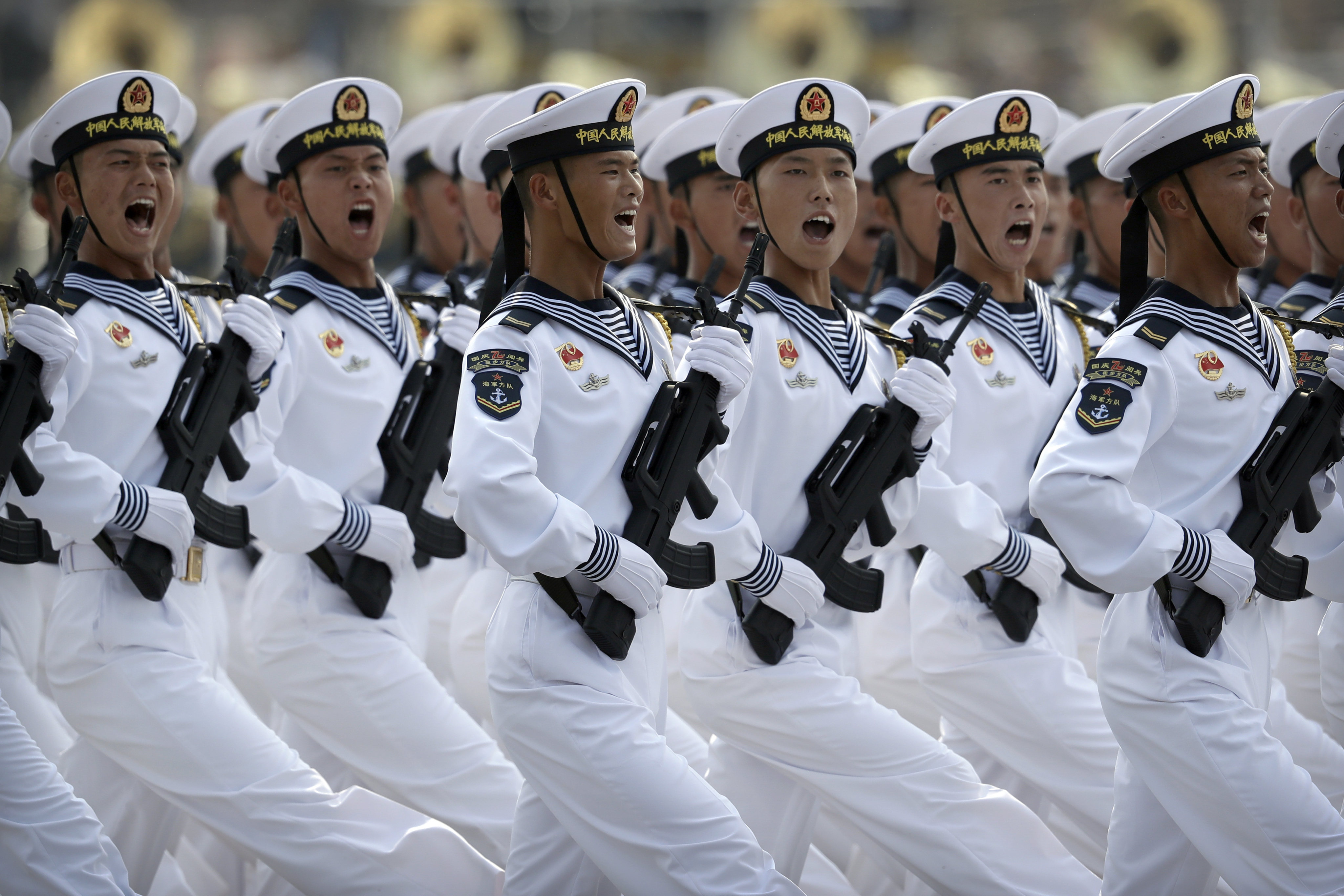 Soldiers from China’s People’s Liberation Army (PLA) Navy march in a parade to commemorate the 70th anniversary of the founding of Communist China in Beijing in 2019. Britain’s national security adviser has called for better communication between the West and China and Russia to avoid a nuclear conflict. Photo: AP