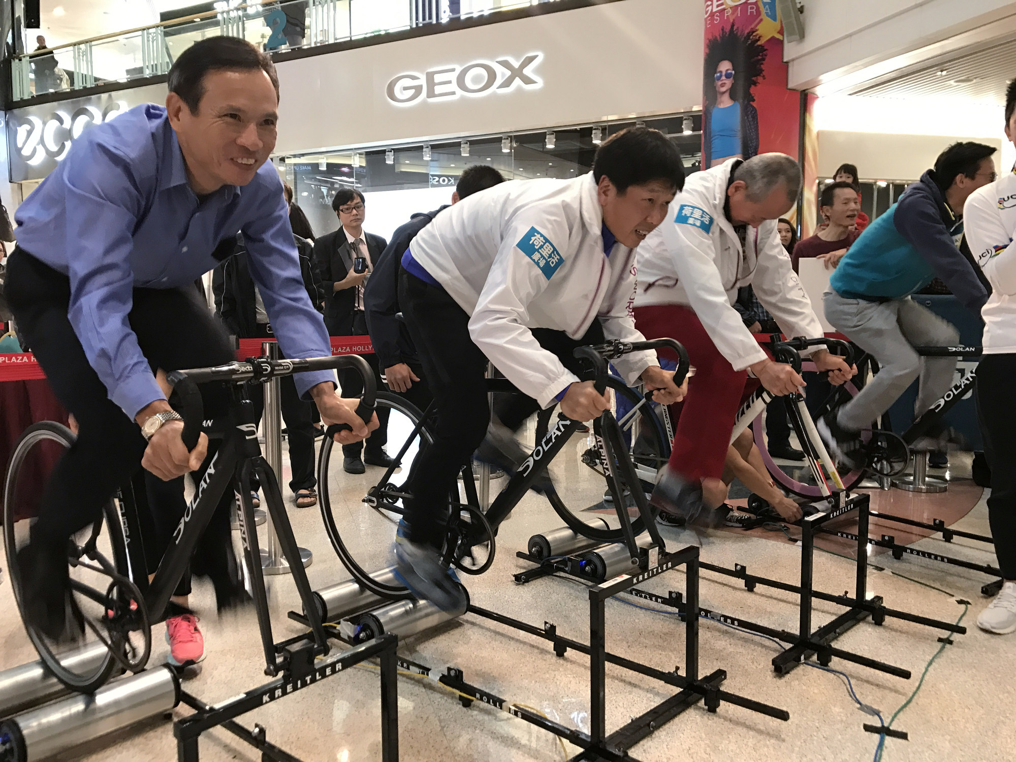 Cycling Association chairman Leung Hung-tak (left) on a warm-up bike. Photo: SCMP