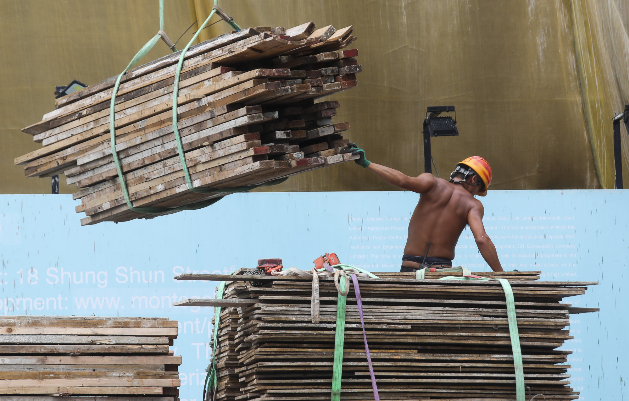A construction worker in Yau Tong on June 13. Photo: Xiaomei Chen