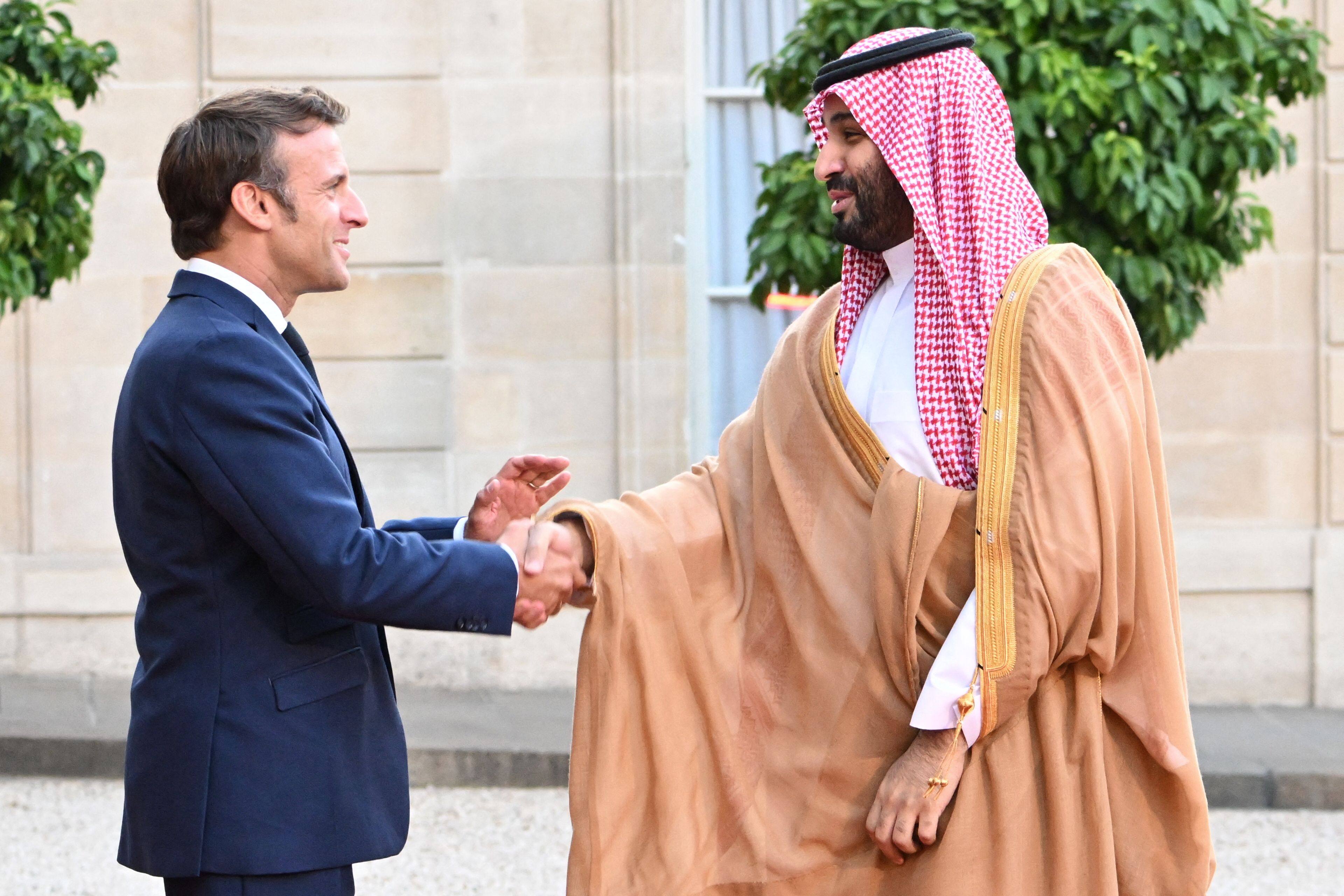 France’s President Emmanuel Macron greets Saudi Crown Prince Mohammed bin Salman at the Elysee Palace in Paris on Thursday. Photo: AFP