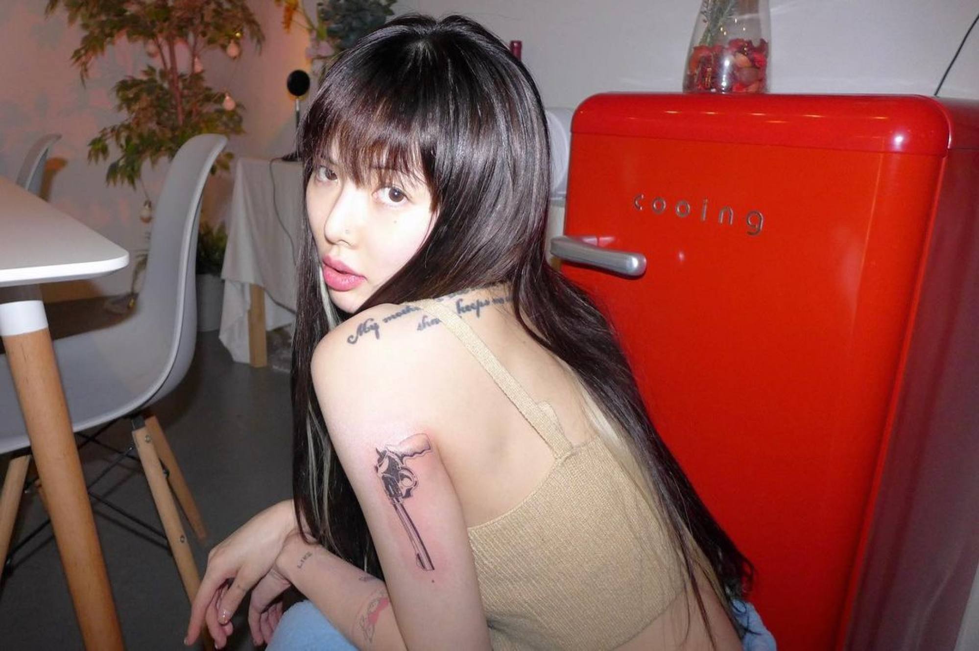 Hyuna shows off the body art on her left arm and shoulder. Photo: @hyunah_aa/Instagram
